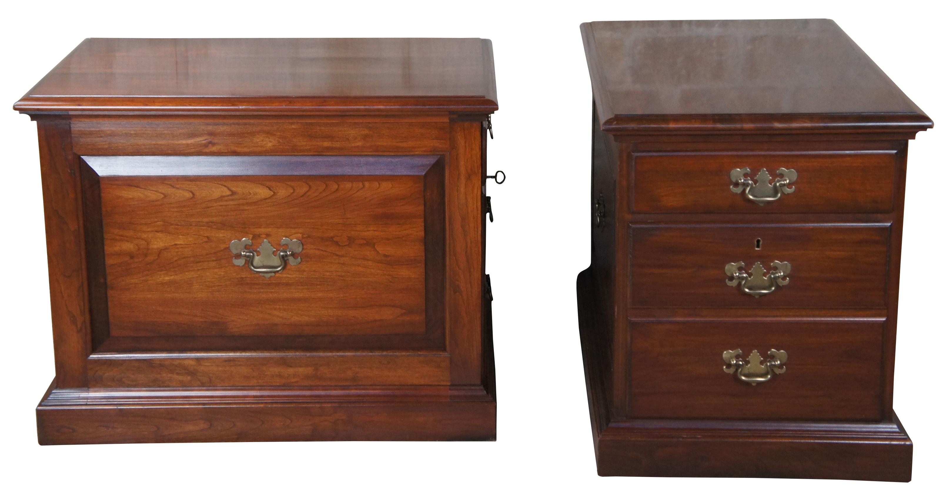 An exceptional and rare pair of side table or file cabinets by Pennsylvania House, circa 1960s. Made from solid cherry with oak drawer construction in Chippendale or Georgian manner. Features a upper drawer and large lower file drawer (dovetailed)