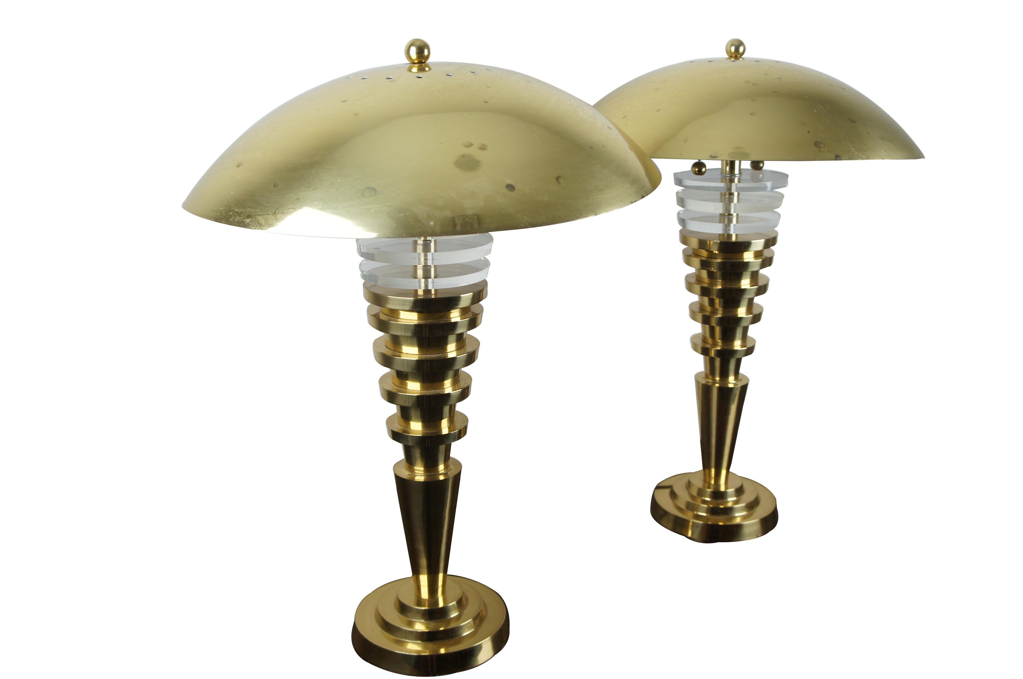 2 vintage Regency brass acrylic MCM Lucite table lamps Charles Hollis Jones pair

Charles Hollis Jones is an American artist and furniture designer known for his use of acrylic and lucite.
This beautiful vintage pair of lamps feature brass and