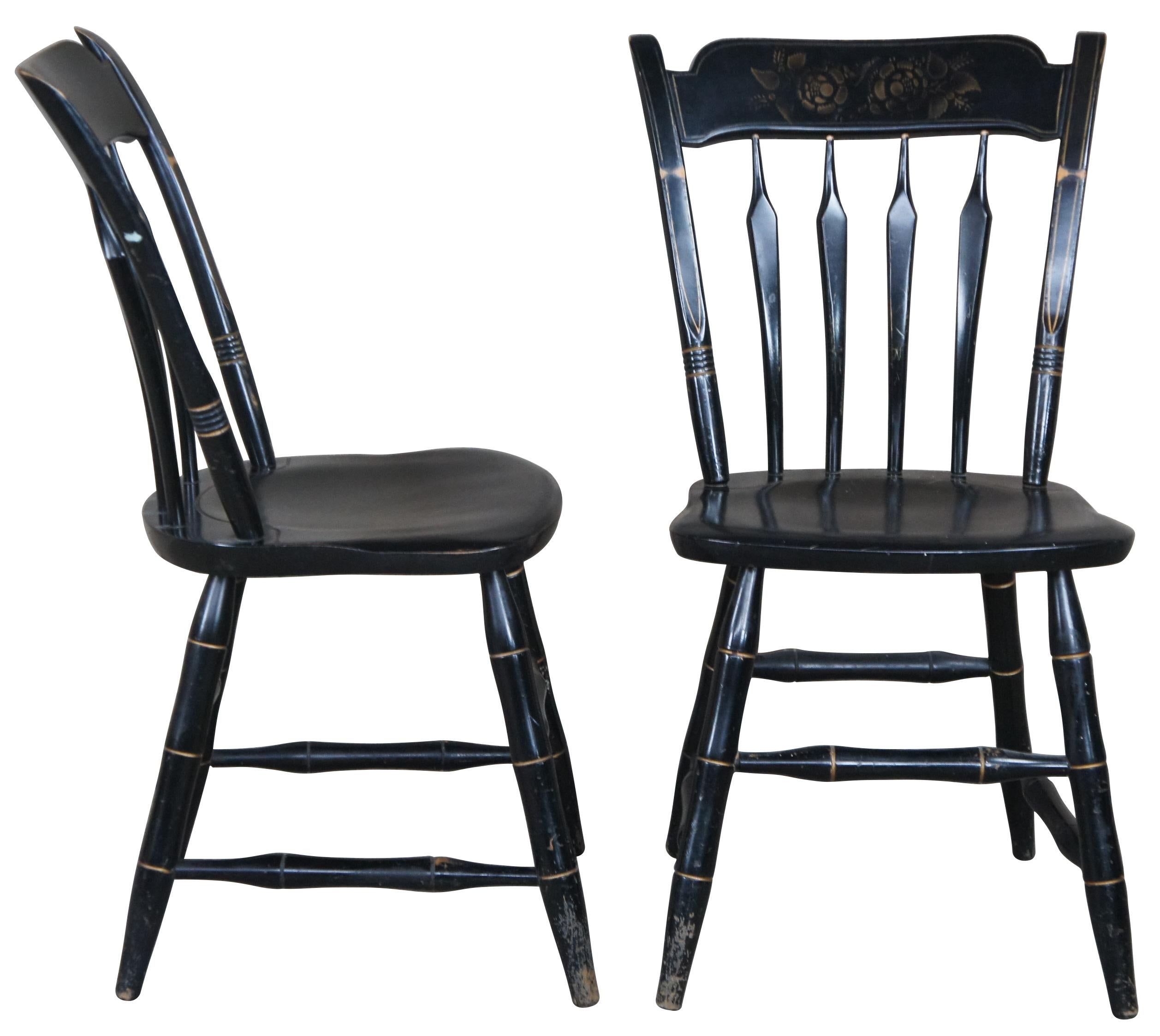 2 S. Bent & Bros Hitchcock style colonial windsor thumb back side chairs. Made from maple with a black finish, stenciled back and gold trim.
S. Bent & Brothers, Inc out of Gardner Ma. was started in 1867 and made colonial chairs, rockers,