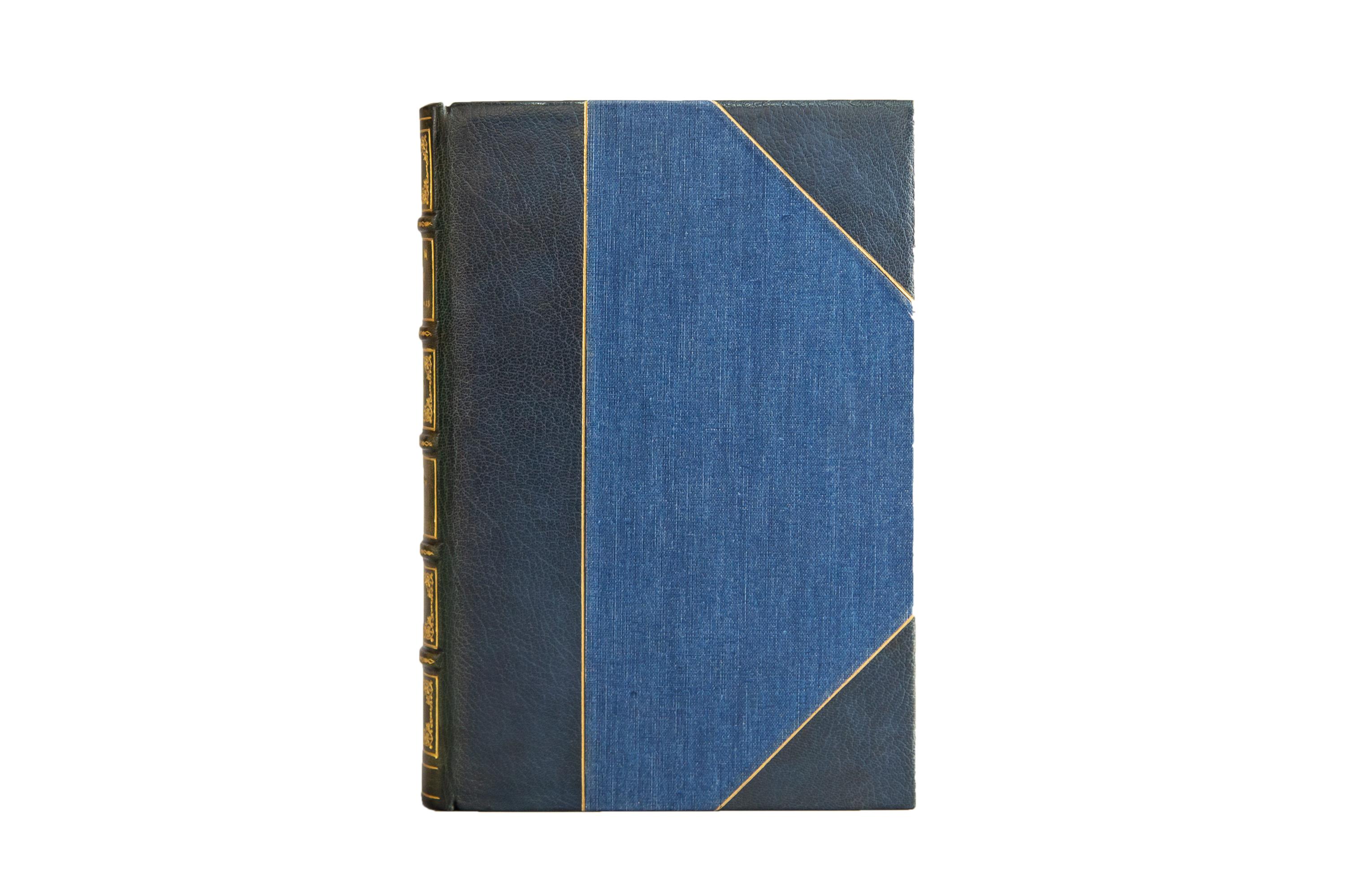 2 Volumes. Carl Sandburg. Abraham Lincoln: The Prairie Years. First Edition. Bound and signed by Maurin in 3/4 navy morocco and linen boards. Raised band spines gilt with ornate Americana gilt detailing. Top edge gilt with marble endpapers. 105