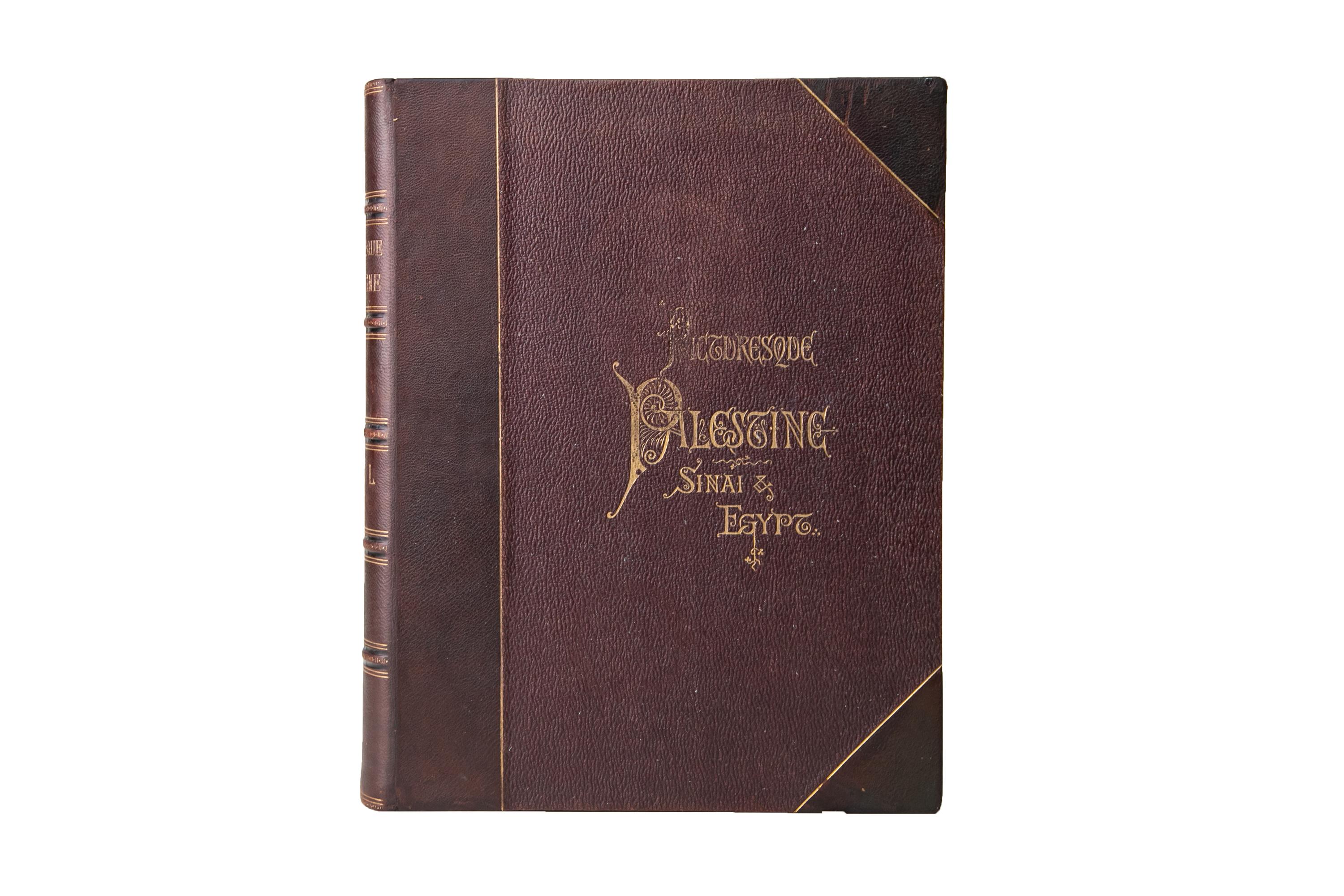 2 Volumes. Colonel Wilson, Picturesque Palestine, Sinai & Egypt. Bound in 3/4 brown morocco and linen boards with gilt-tooled borders and title lettering. The spines display raised bands, borders, and label lettering, all gilt-tooled. All of the