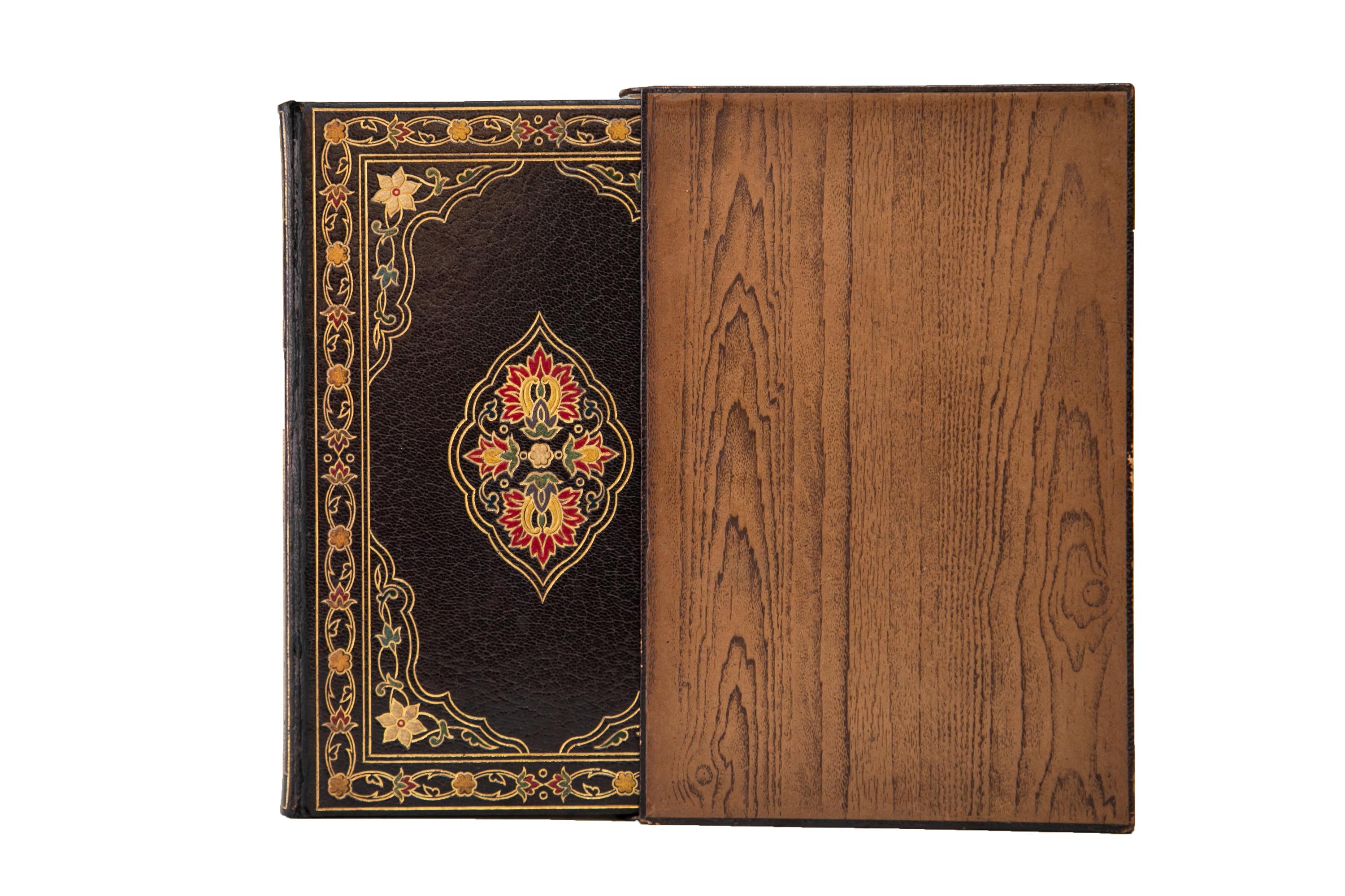 2 Volumes. Edward Fitzgerald, Rubáiyát of Omar Khayyám. First Edition. Bound by Pagnant in full brown morocco with the covers displaying ornate bordering and central floral gilt-tooled details with red, green, yellow, blue, white, and purple inlay.