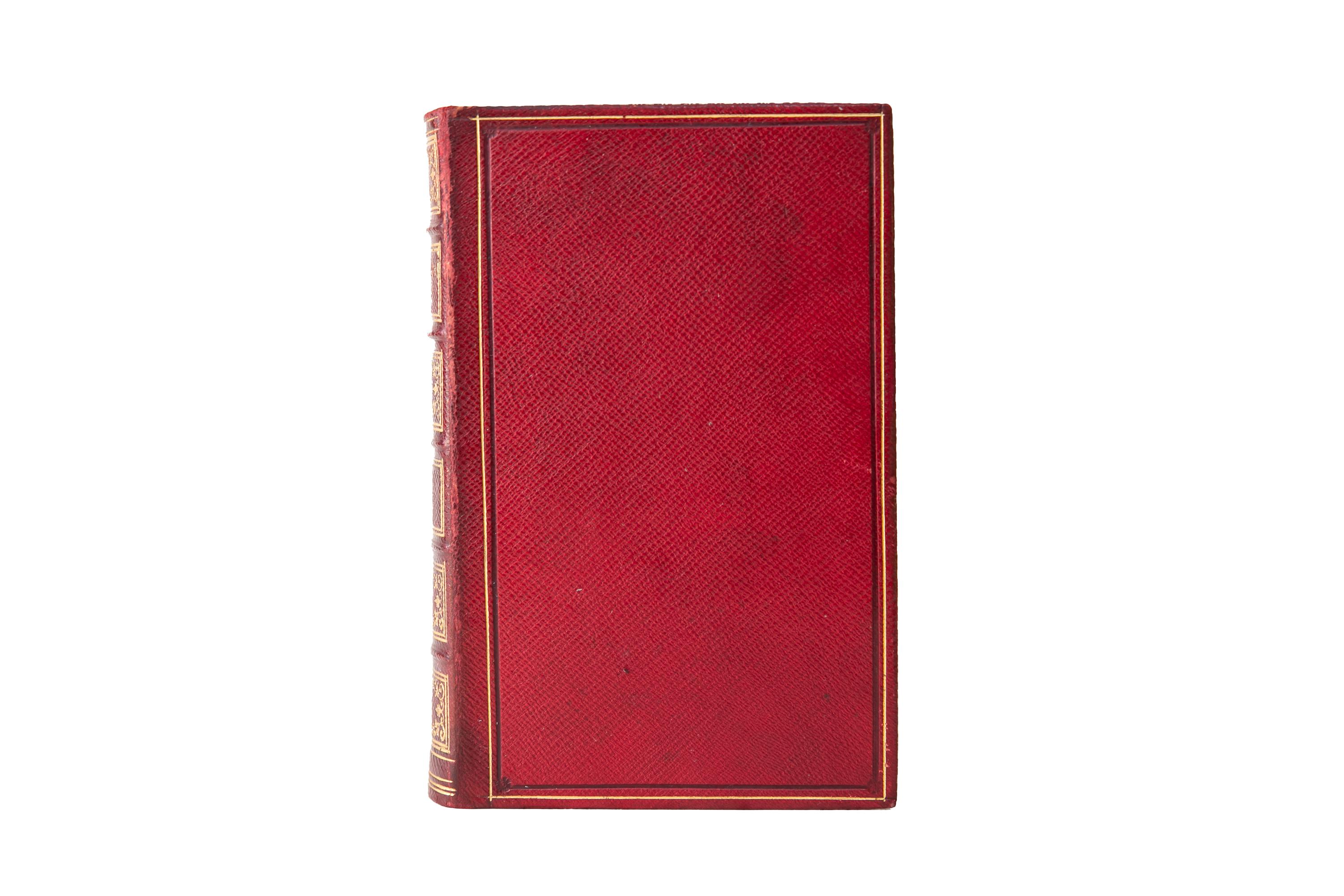 2 Volumes. Elizabeth Barrett Browning, The Poems Reliure en plein maroquin rouge, avec les couvertures et les dos à nerfs dorés. Toutes les tranches sont dorées. New York : C.S.. Francis & Co, 1853.
