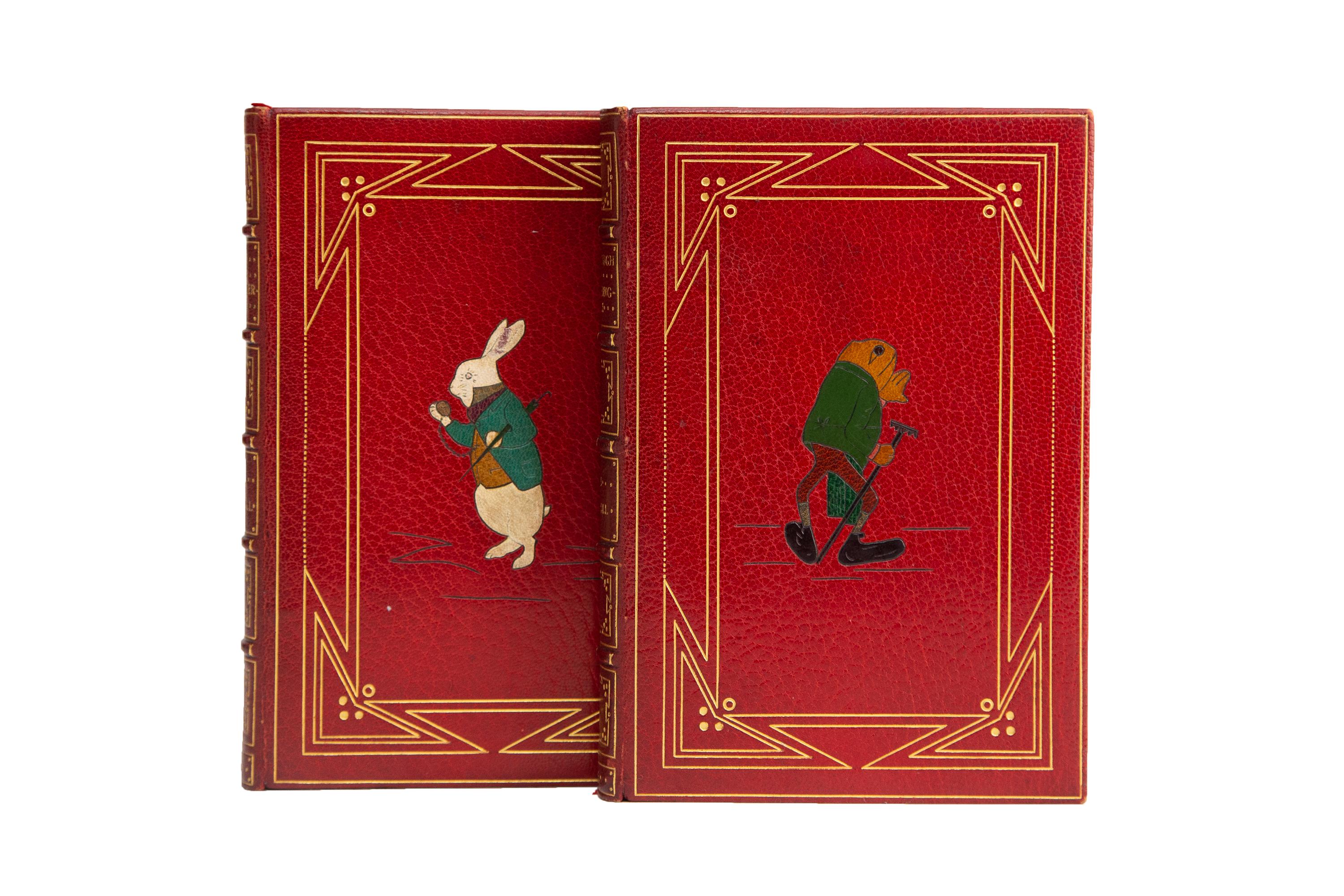 2 Volumes. Lewis Carroll, Alice's Adventures in Wonderland & Through the Looking Glass. Early Edition. Bound by Bayntun in full red morocco with inlaid multi-color figures of the White Rabbit and the Frog as well as geometric gilt framing in the
