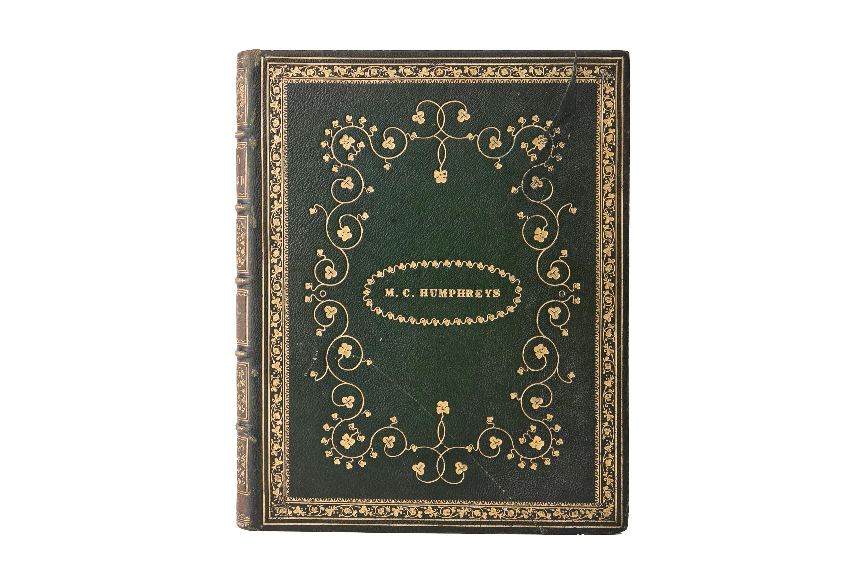 2 Volumes. N.P. Willis & J. Stirling Coyne, The Scenery and Antiquities of Ireland. Bound in full green morocco, gilt-tooled detailing, and raised band spines. All edges gilt with gilt-tooled dentelles. Drawings by W.H. Bartlett. London: George