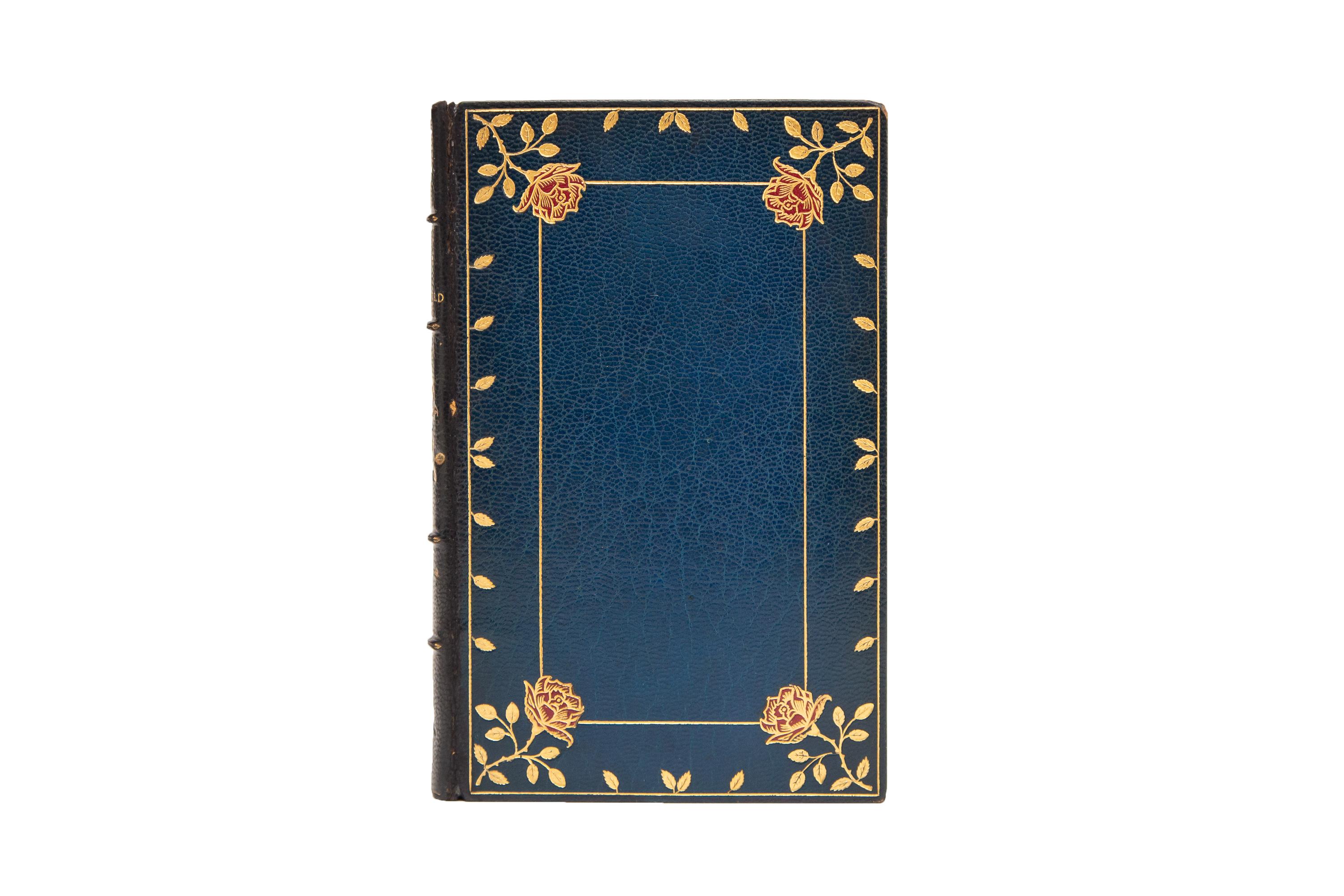 2 Volumes. Oliver Goldsmith, The Vicar of Wakefield. Bound in full blue morocco with beautiful red inlaid roses and floral gilt borders on the covers. Raised band spine gilt with panels displaying gilt detailing, titles, and a red inlaid rose. All
