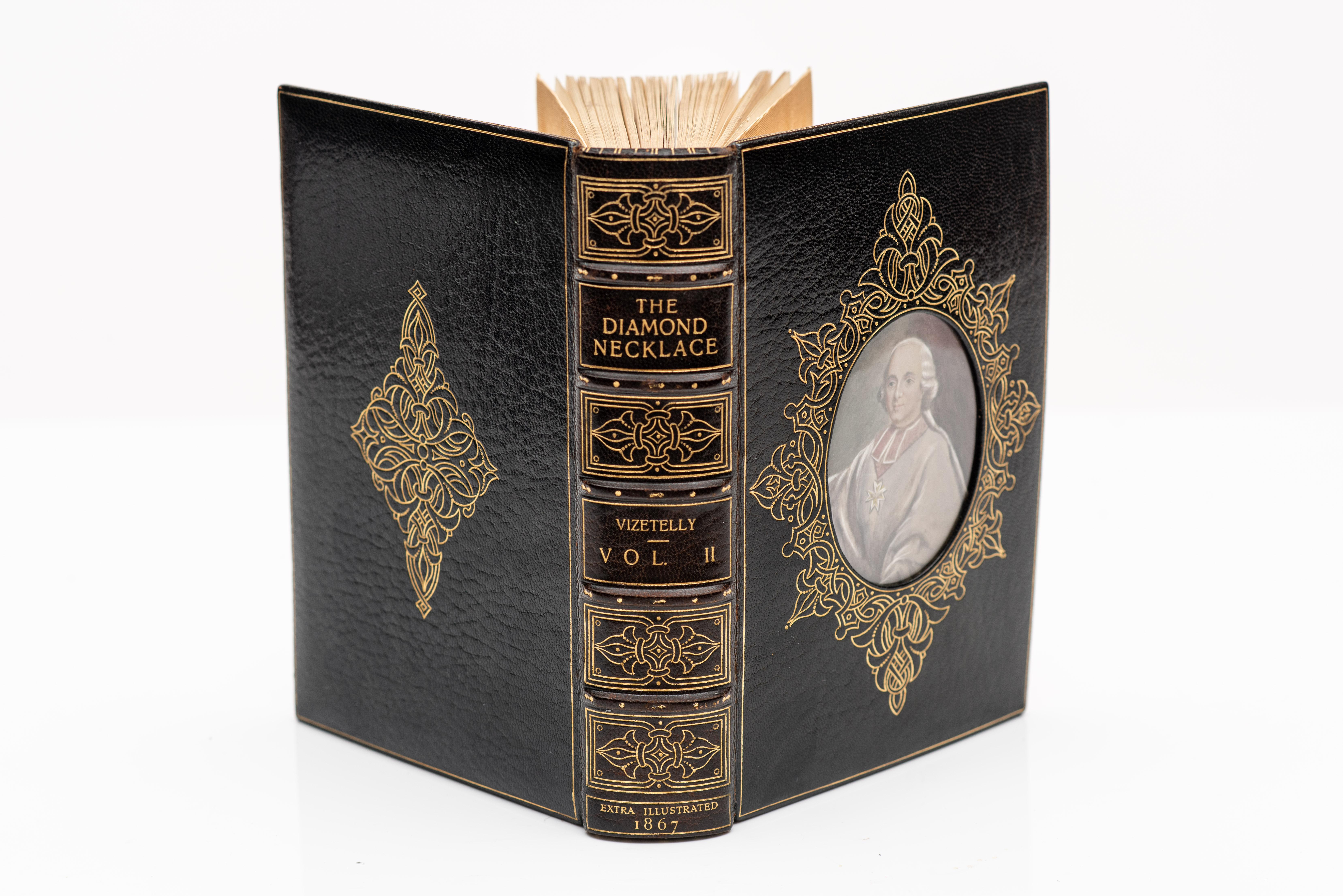2 Volumes. Vizetelly, Henry. The Story Of The Diamond Necklace. (Short Story by Guy DeMaupassant) Bound in full blue morocco with an oval portrait under glass of Marie Antoinette and Richelieu on front covers by Bayntun.
Cosway Style Bindings)