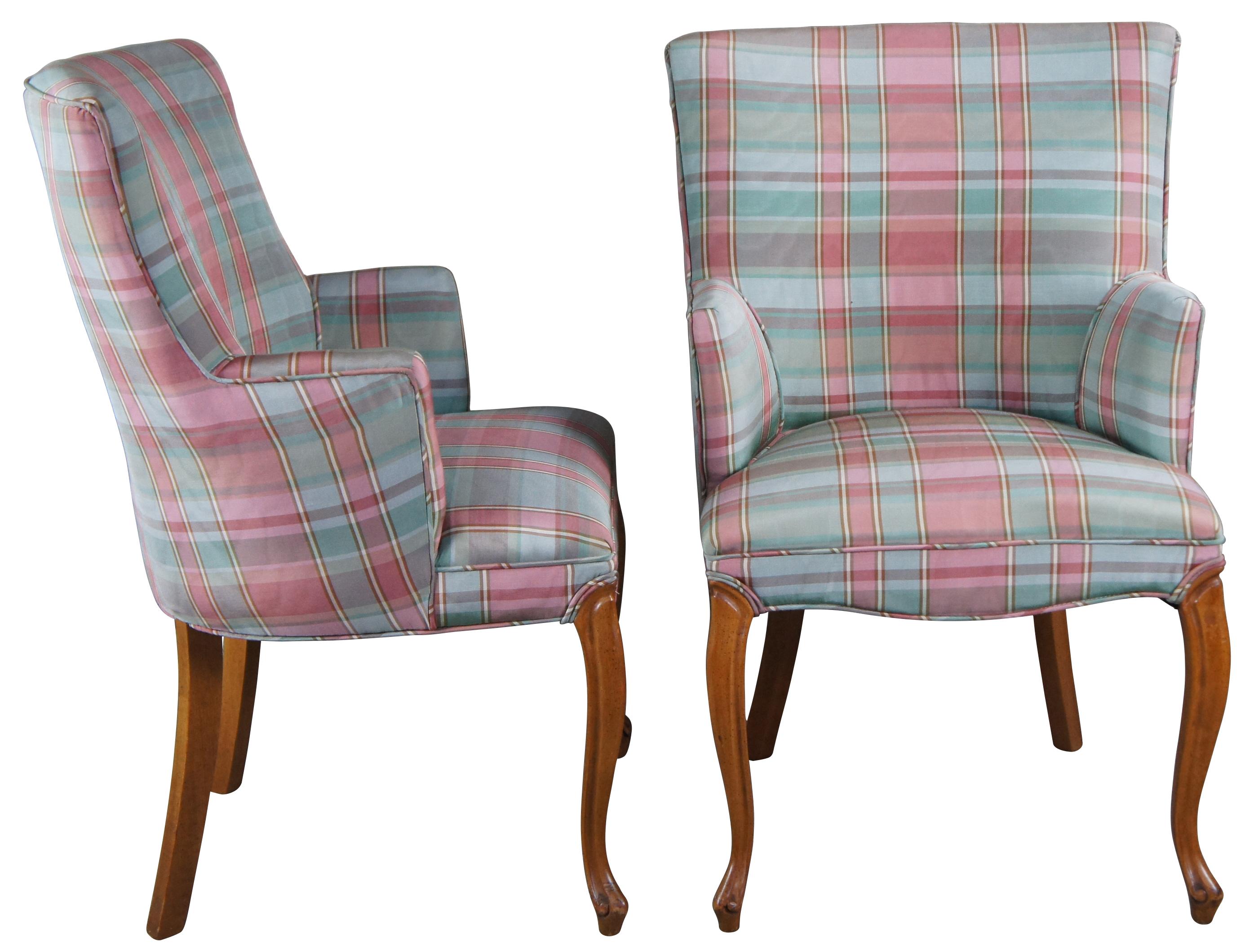 Pair of two vintage French occasional chairs featuring a flared upper back and half arm with pink and green silk plaid upholstery and serpenine leg with cabriole feet. Circa third quarter of 20th century.
 