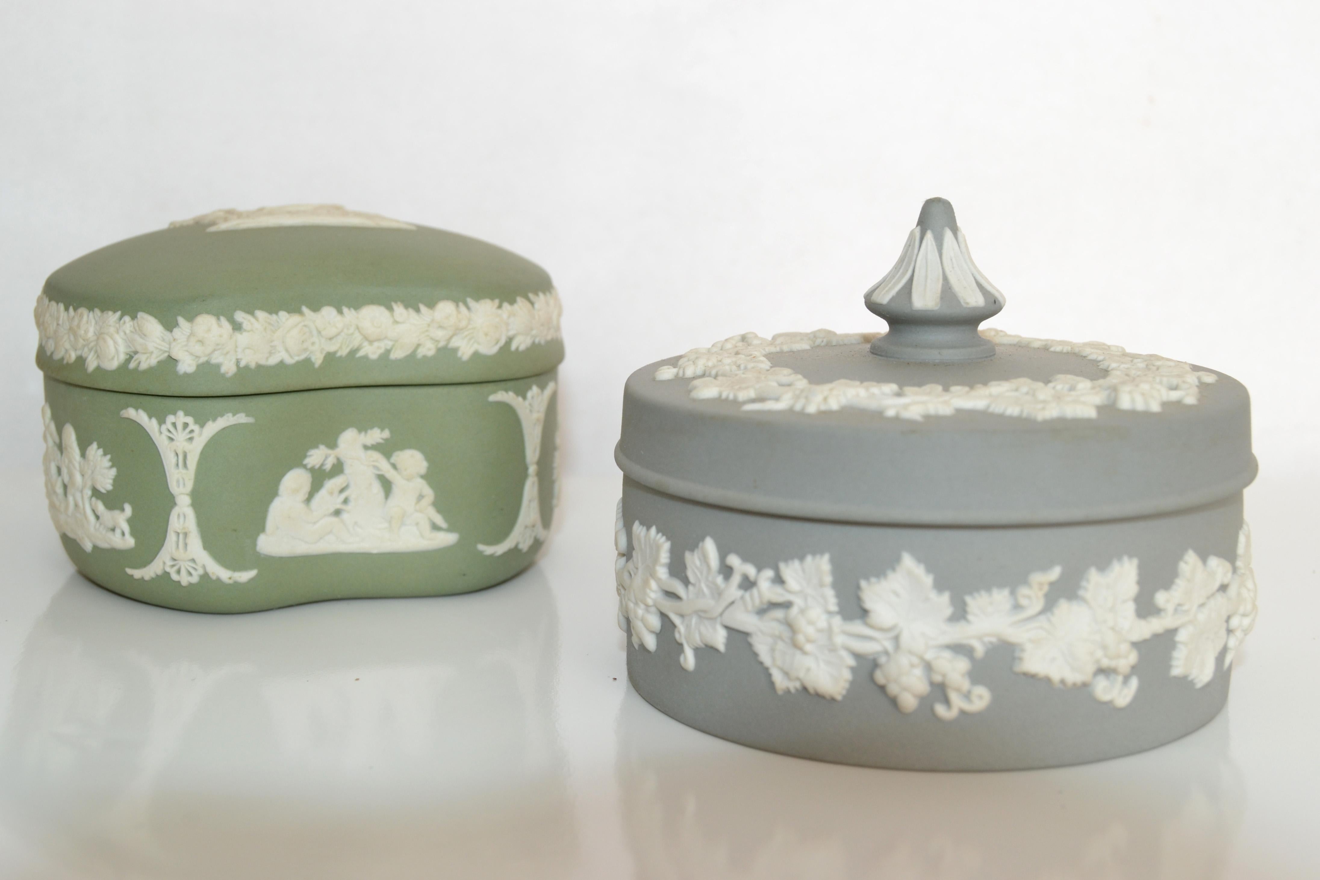 Beautiful Set of 2 English Wedgwood Jasperware covered jewelry, keepsake or trinket box in Wedgwood pale Green and gray. Features a repeating motif of white, high relief Grape Vine leaves on the gray and alternating with floral sprigs and a