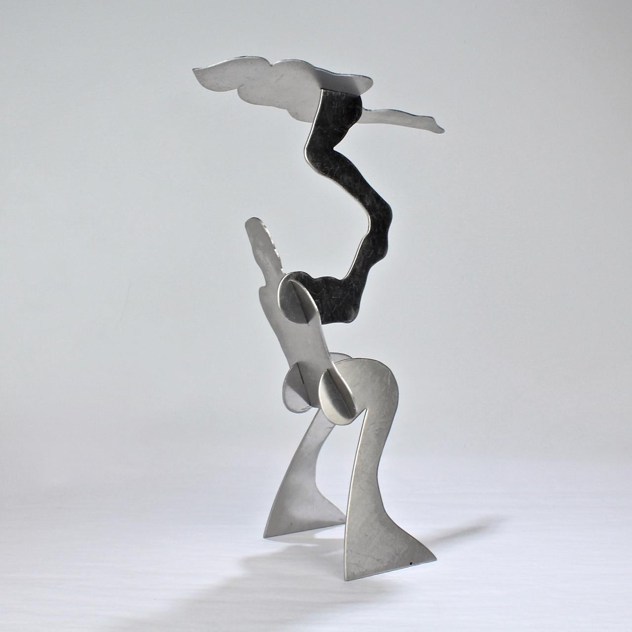 Event and The Test  - a group of 2 Mid-Century Modern aluminum acrobat sculptures.

William D. King (1925-2015)

These interlocking aluminum sculptures were part of a series, which was sold principally in museum gift shops in the 1960s-1970s during