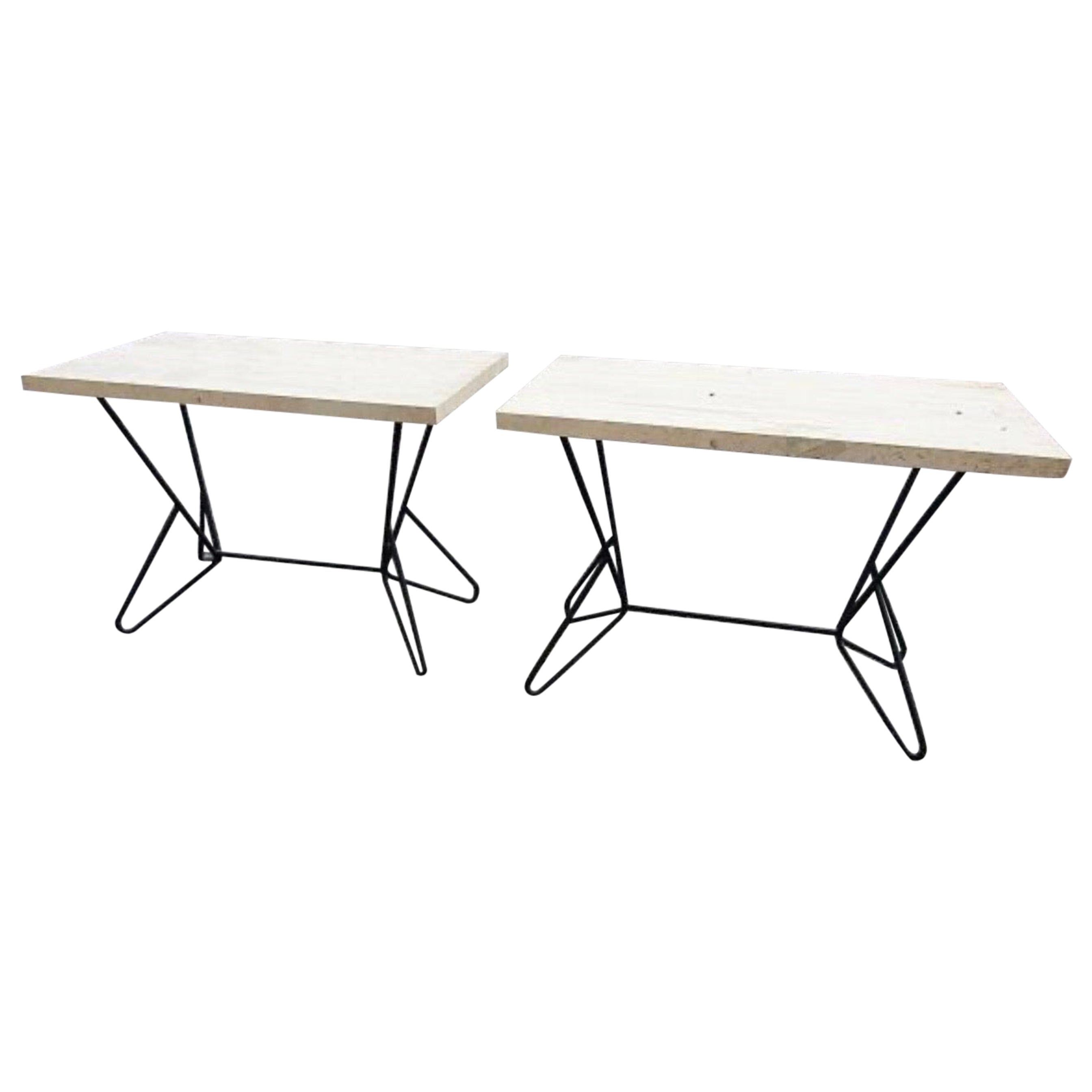 2 tables consoles en fer forgé, plateaux en travertin, vers 1950/1960