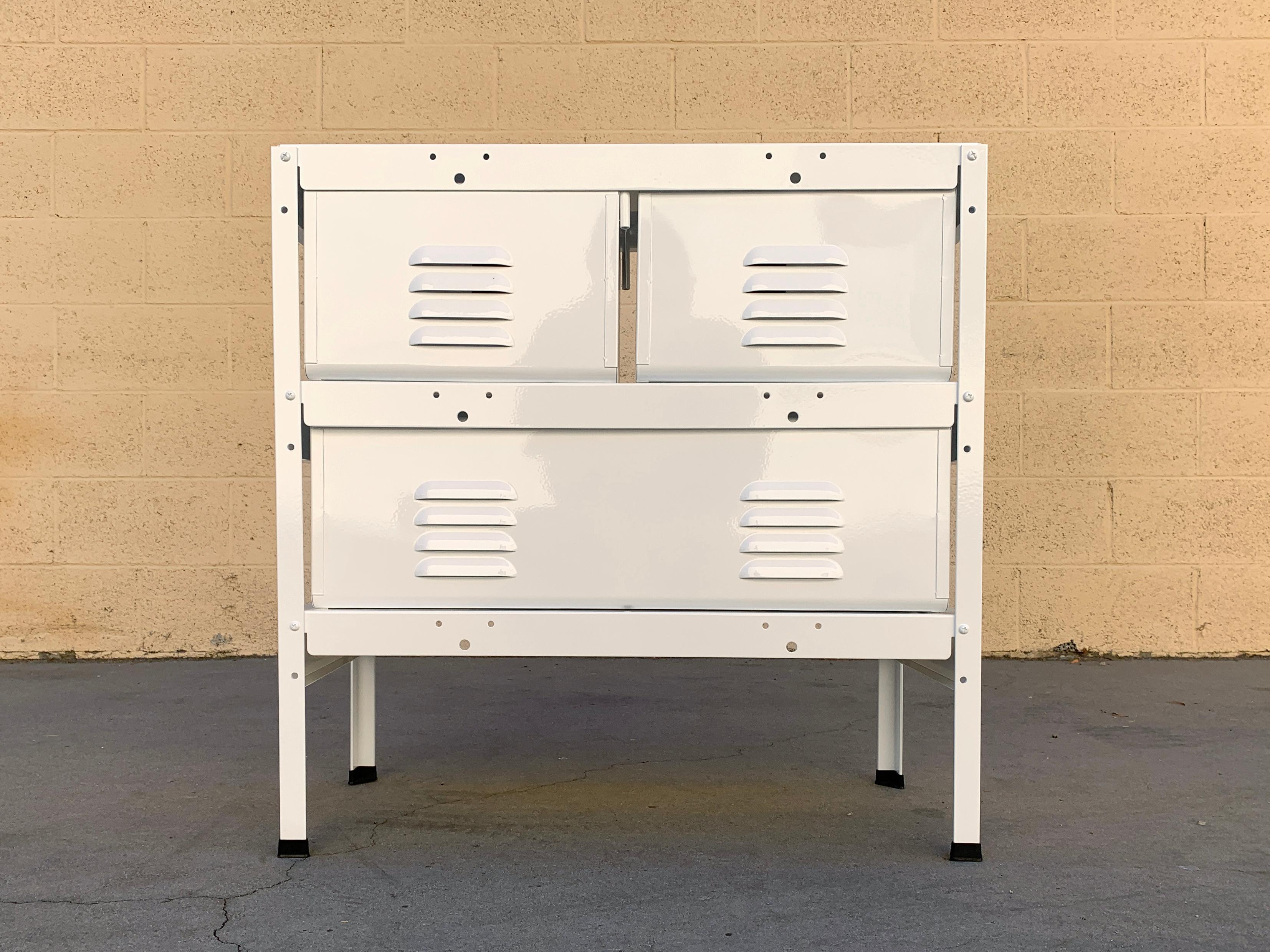 Our newly fabricated locker basket units are inspired by the midcentury classics we've been refinishing for years. Featured here is a 2 x 2 unit in monochrome gloss white baskets in a gloss white frame. This unit includes two single-size basket and