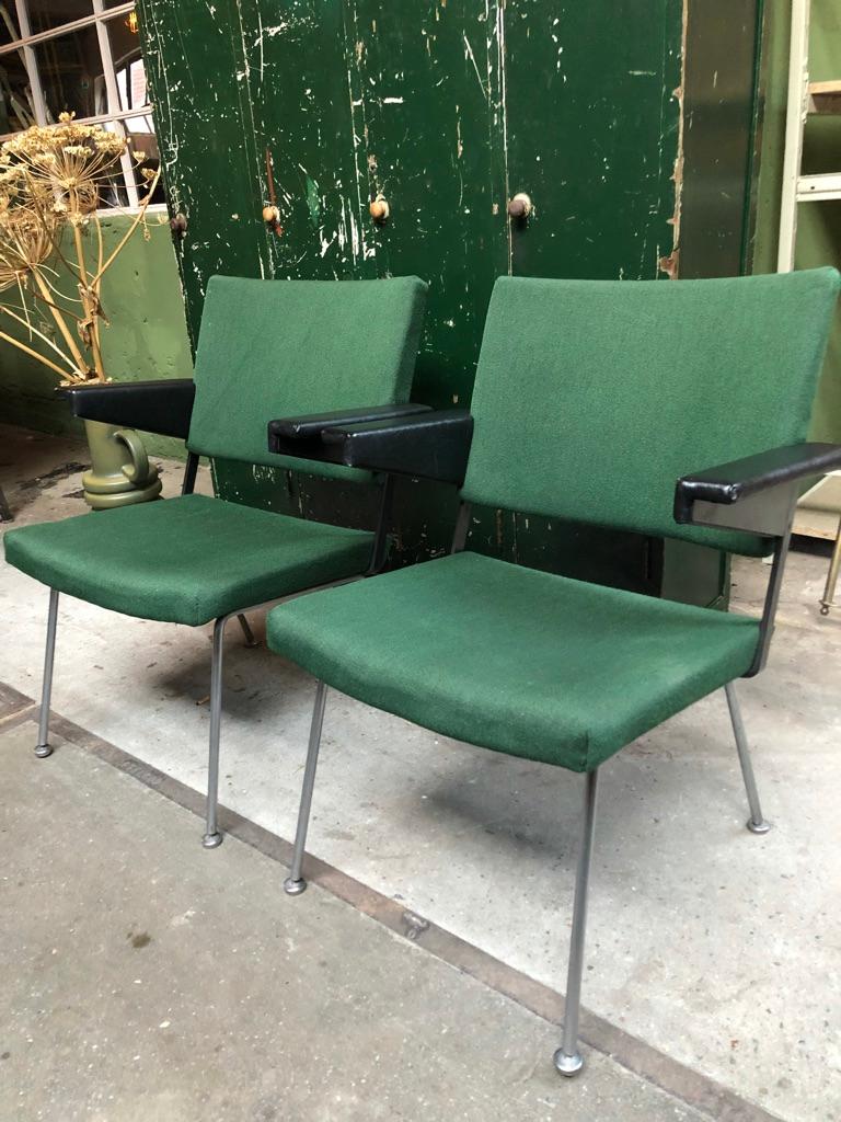 Completely original, Mid-Century Modern, lounge chairs by André R. Cordemeijer for Gispen. The chairs are very sturdy. The original upholstery and the leather upholstered armrests are good, vintage, condition. 

Dimensions
Height: 76 cm
Width: