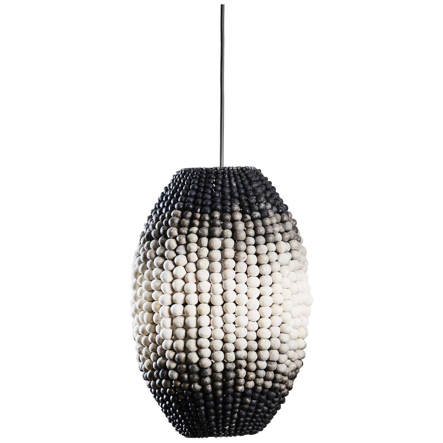 Statement clay beaded lighting, that can be suspended as a single, or in a cluster for maximum impact.

The klaylife barrel pendant has been specially created for those who don’t have an enormous space but still want pendant lighting that packs a