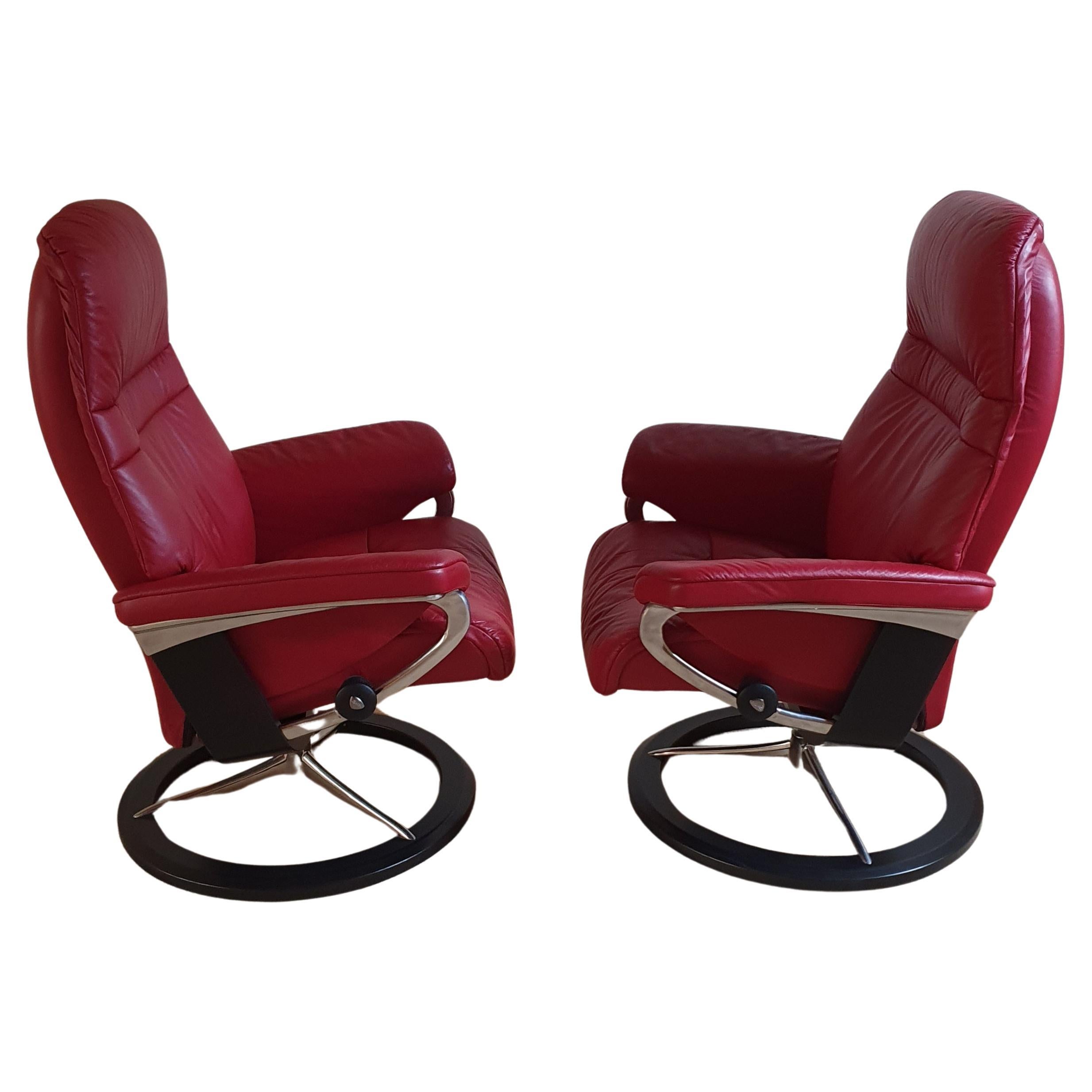 2 x Stressless Aura Recliner chairs with Signature in Cori leather Brick Red