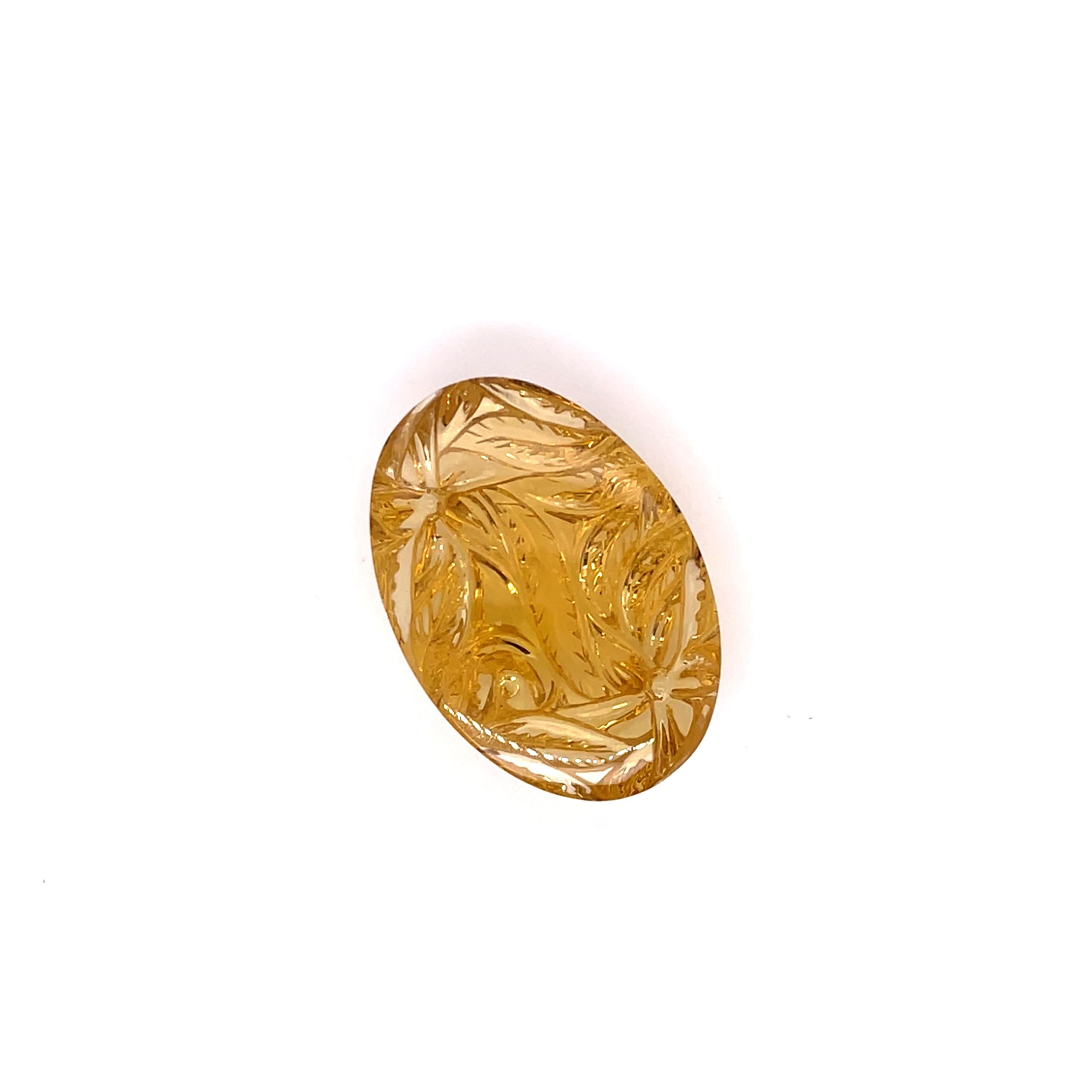 Featuring a pair of yellow-green amethyst carvings, weighing a total weight of 89.92 carats.

Sourced from Brazil, these gems showcase a beautiful blend of yellow and green tones, creating a captivating, nature-inspired look. 

Known for its calming