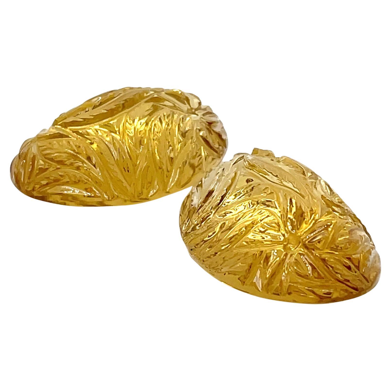 2 Améthystes jaunes vertes sculptées 89,92 cts