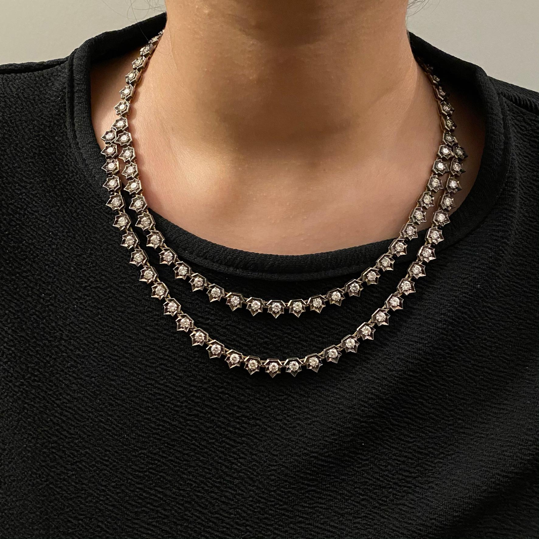 Introducing our Antique Diamond Double Line Necklace, a timeless and elegant piece that transports you to a bygone era of opulence and glamour. This exquisite necklace boasts a stunning 20 carats of diamonds, meticulously set in a regal 14K gold