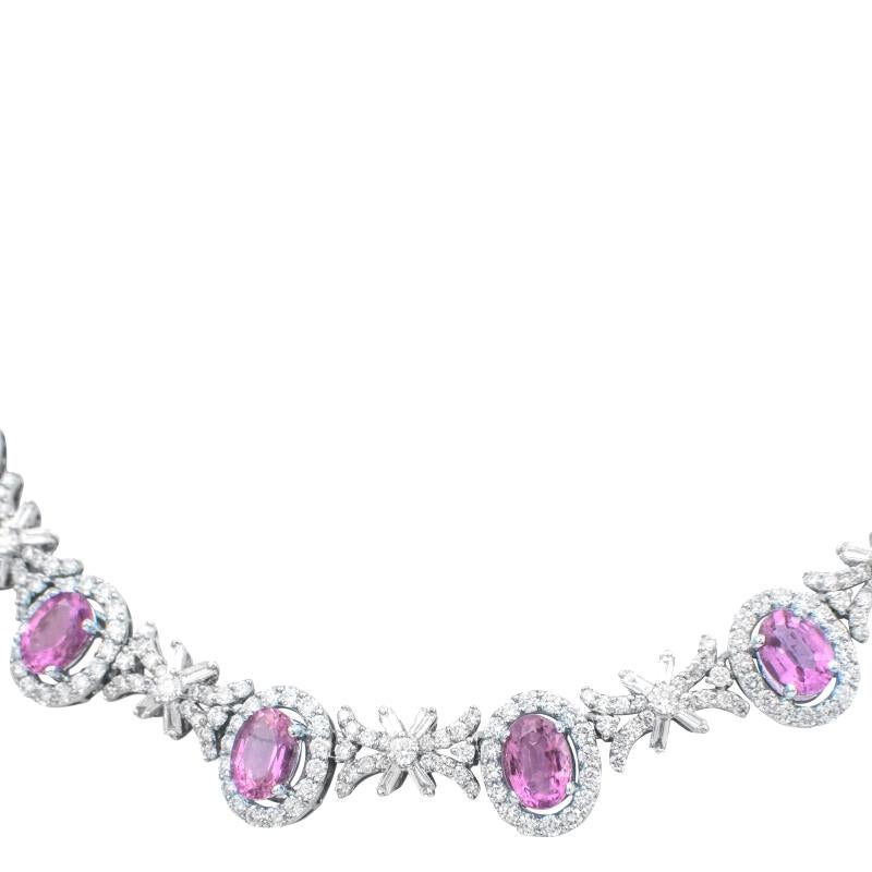 Featuring 9 oval-shaped bubblegum pink sapphires, set with oval-cut diamonds, round brilliant-cut diamonds and baguette-cut diamonds.

Sapphires weighing a total of approximately 7 carats
Diamonds weighing a total of approximately 13 carats
18 karat