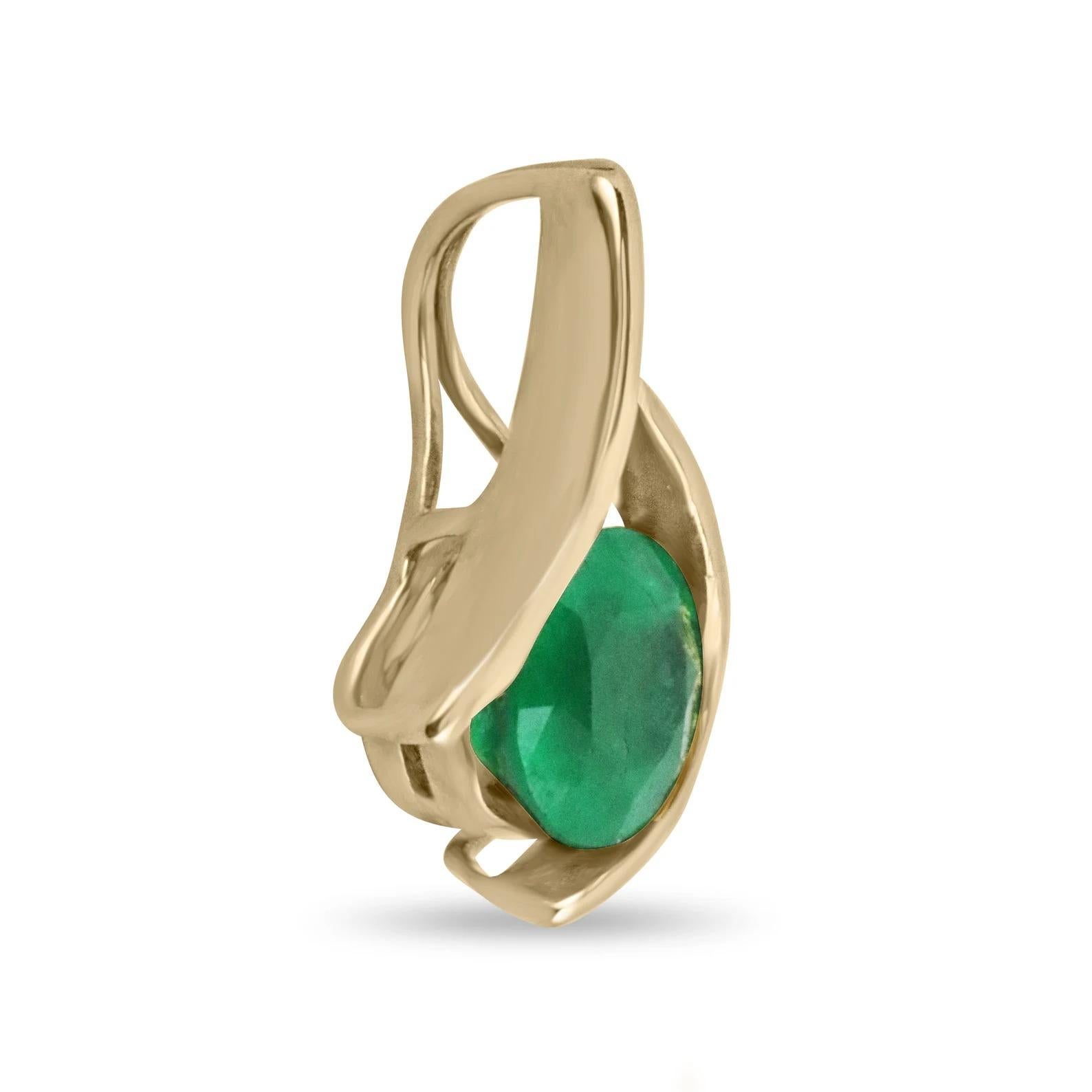This is a one-of-a-kind emerald pendant. This lovely piece features a solitaire, round-cut Colombian emerald showcasing a vivacious electric green color, along with very good luster. Set in 14K yellow gold.

14K Gold - 18'' cable chain is included