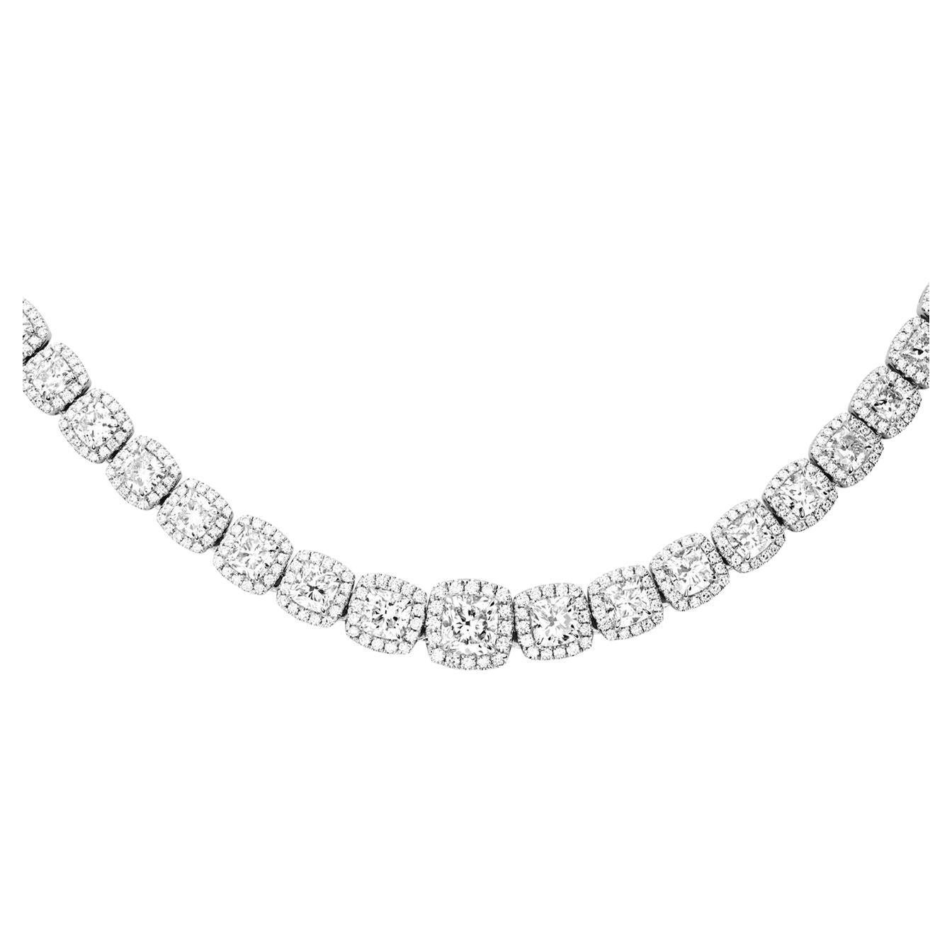 Introducing our exquisite Platinum Necklace, a true embodiment of timeless elegance and sophistication. This captivating piece boasts a remarkable ensemble of diamonds, making it the perfect statement accessory for those special moments.

