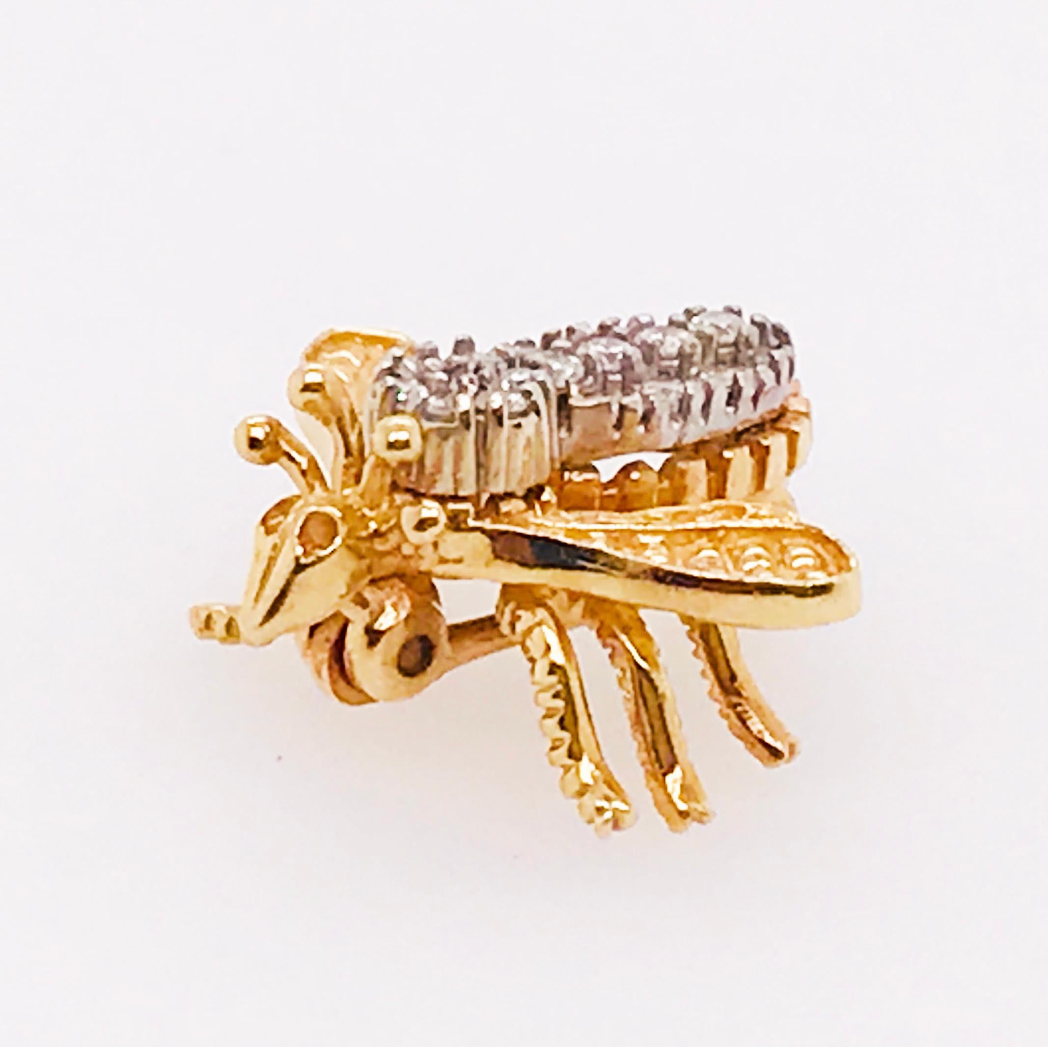 This adorable honey bee pin is paved in genuine natural round brilliant diamonds. There is a total of 0.20 carats total diamond weight. The diamonds are top quality, VS clarity and E-F Color! The honey bee is made with 14 karat yellow and white