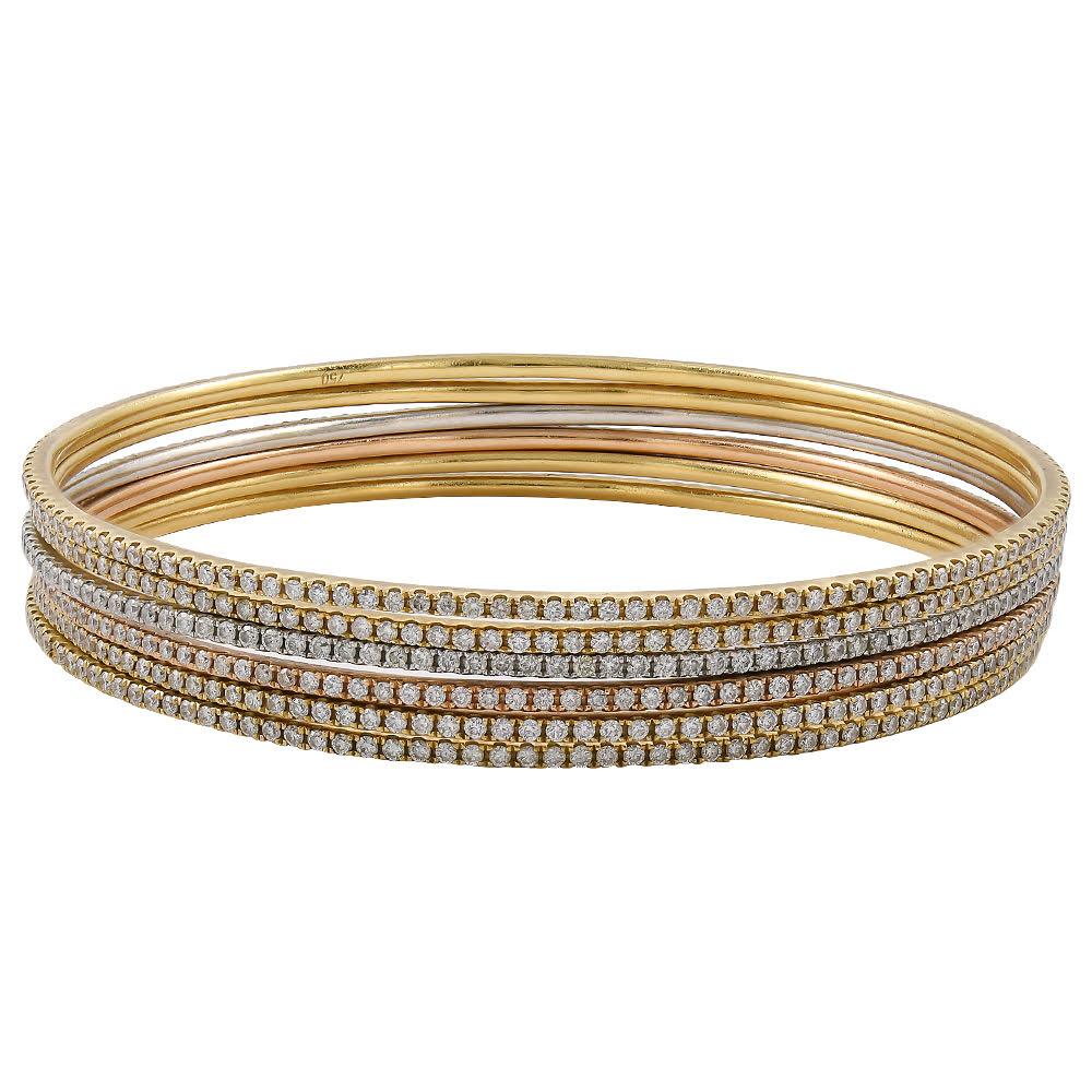 Set of yellow gold rose gold white gold bangles.
This beautiful set of bangles is compromised of 10 Italian made bangels.
Set with approximately 2 carats of white round cut diamonds in each bangle.
the very thin design and great craftsmanship of