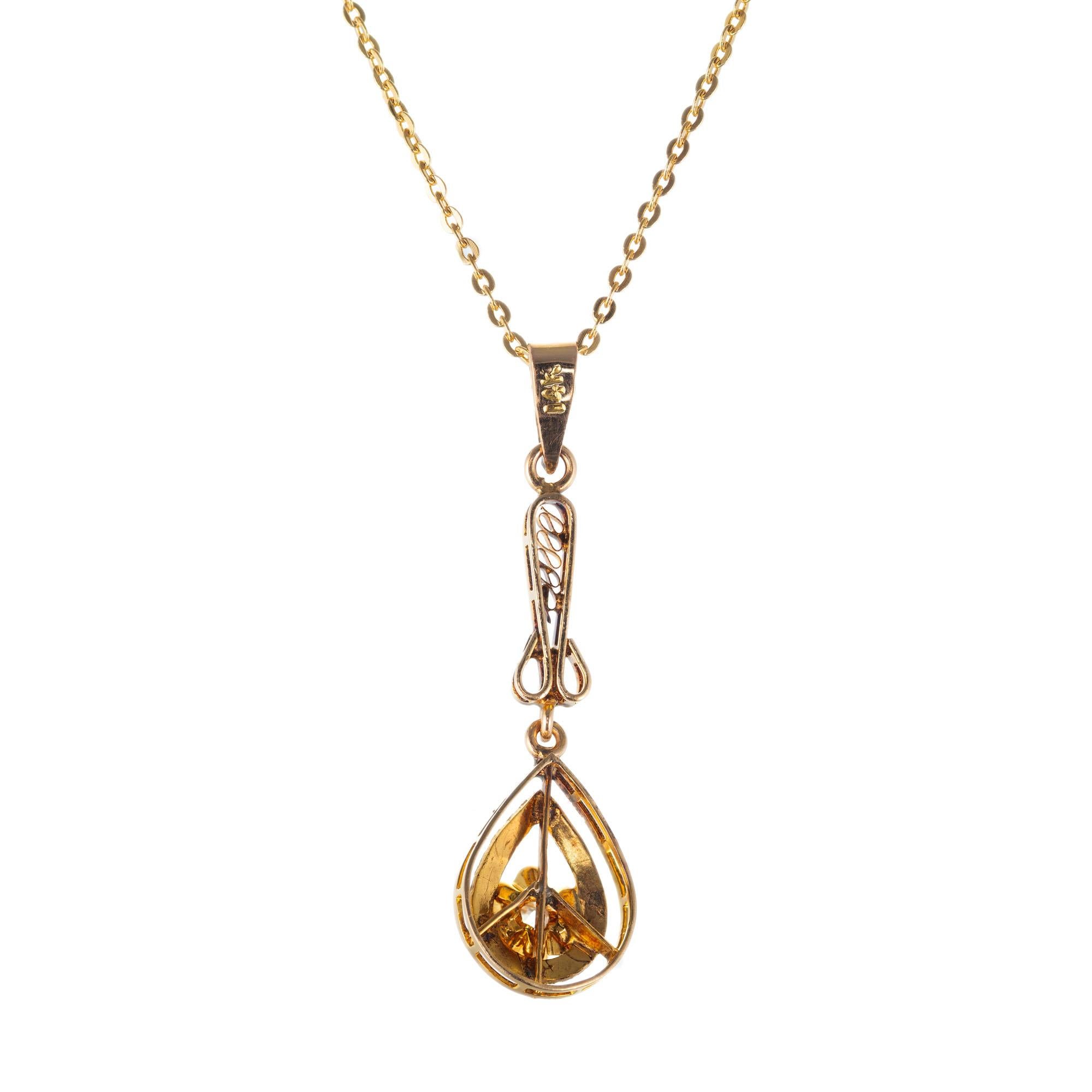 Handmade Victorian 1900's old mine cut .20 carat diamond pendant necklace. Filigree, hand engraved pendant in 14k yellow gold. 17 inches in length. Later 14k yellow gold chain.

1 old mine cut diamond, G VS approx. .20cts
14k yellow gold 
2.7