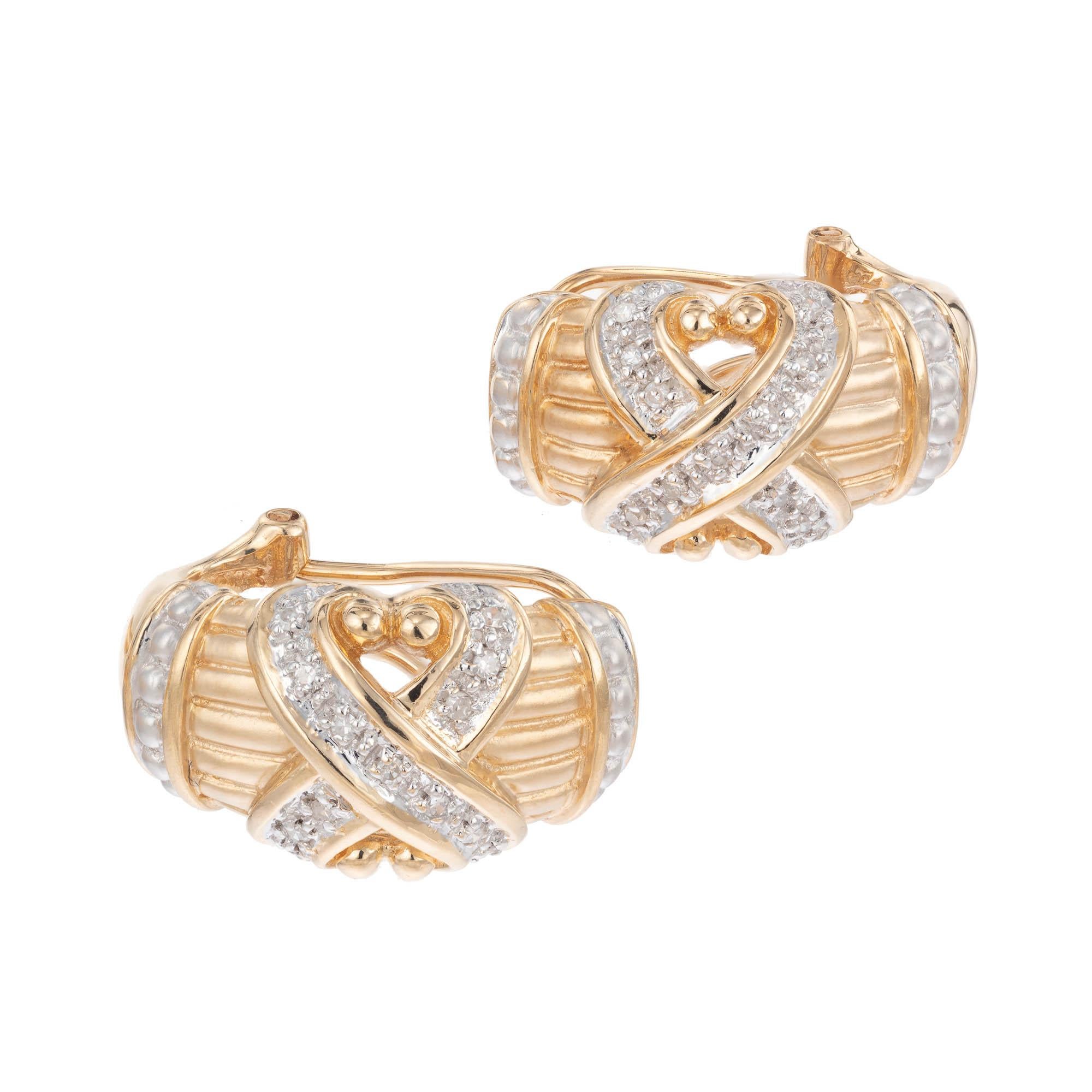 Diamond X design 14k yellow and white gold clip post earrings.

26 round single cut H-I SI-I diamonds, Approximate .20 carats 
14k Yellow Gold
14k White Gold
Stamped: 14k 585
Top to Bottom: 20.9mm
Width: 12.2mm 
Depth or Thickness: 1.5mm
