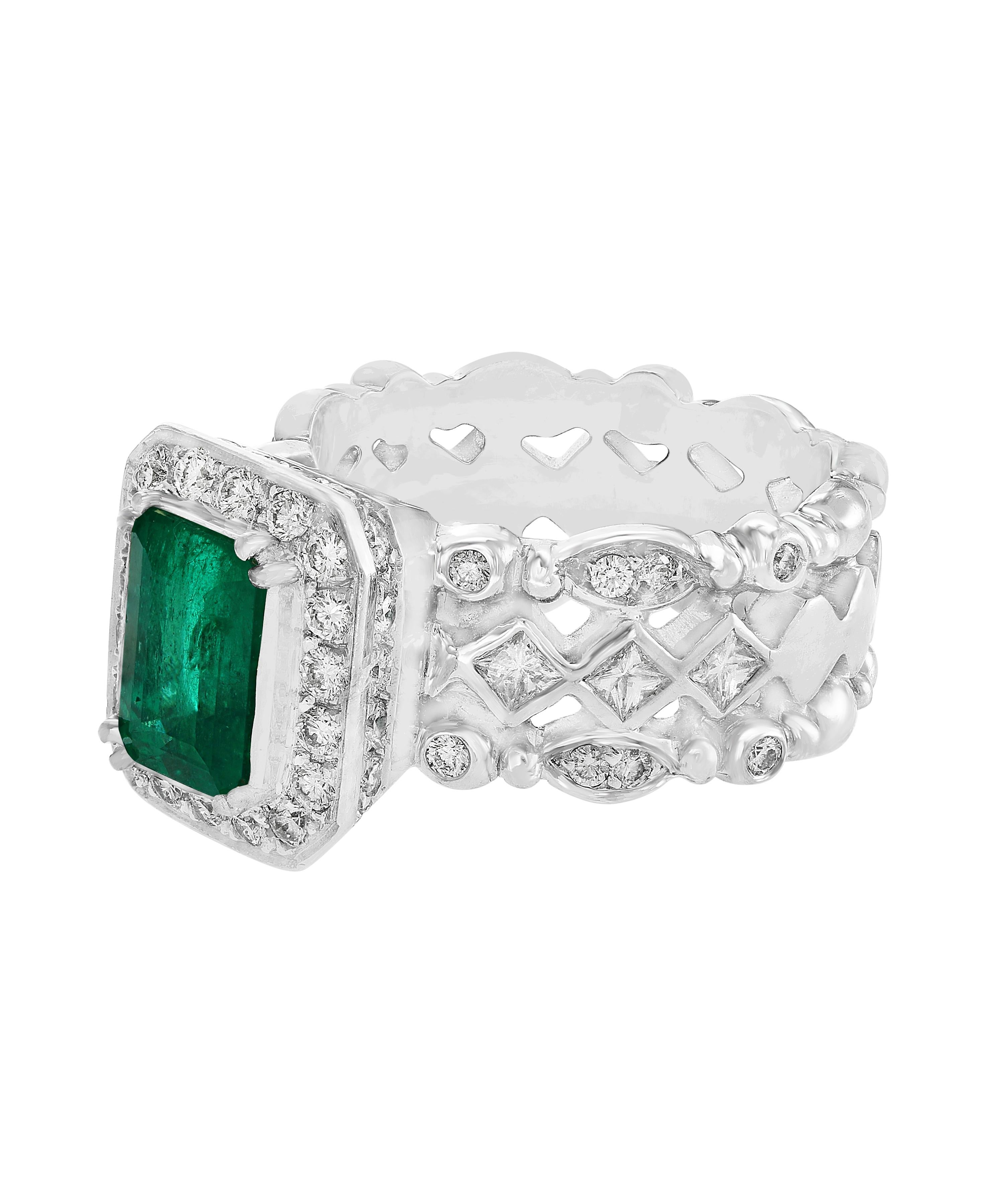 This is a classic Cocktail Designer ring created by Designer Doris Panos. It features a 2.0 Carat Colombian Emerald and Diamond Ring, Estate with no color enhancement. The ring is made of 18 Karat white gold and weighs 12.4 grams. The ring size is