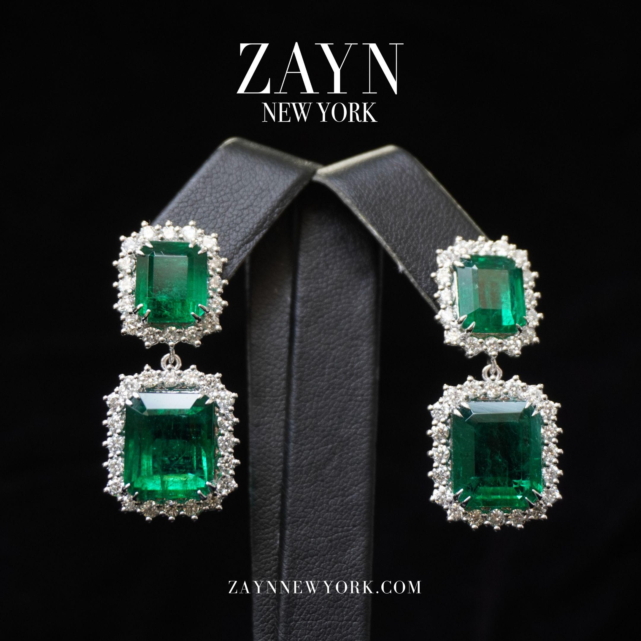 Women's 20 Carat Emerald Dangle Earrings With 2.5 Carat Halo Diamonds 18K White Gold For Sale