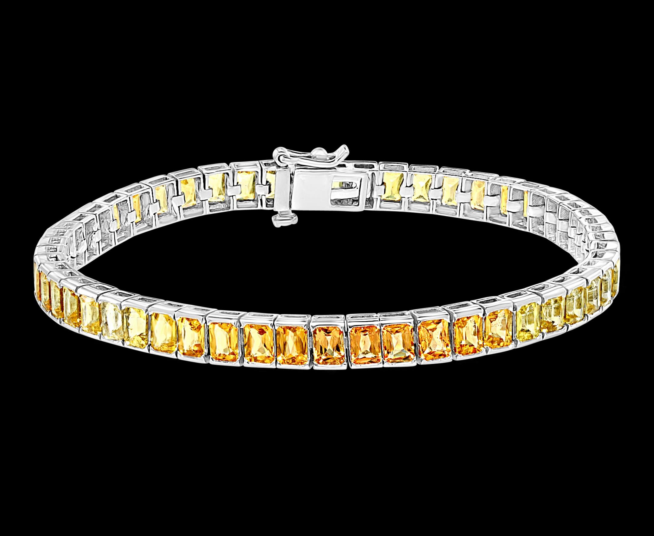  This exceptionally affordable Tennis  bracelet has  Radiant cut Natural Yellow sapphires .
 Sapphires  colors are different shades of yellow from light yellow to gradually going to Orange.
Beautiful colors , very Vibrant
Size of the stone is