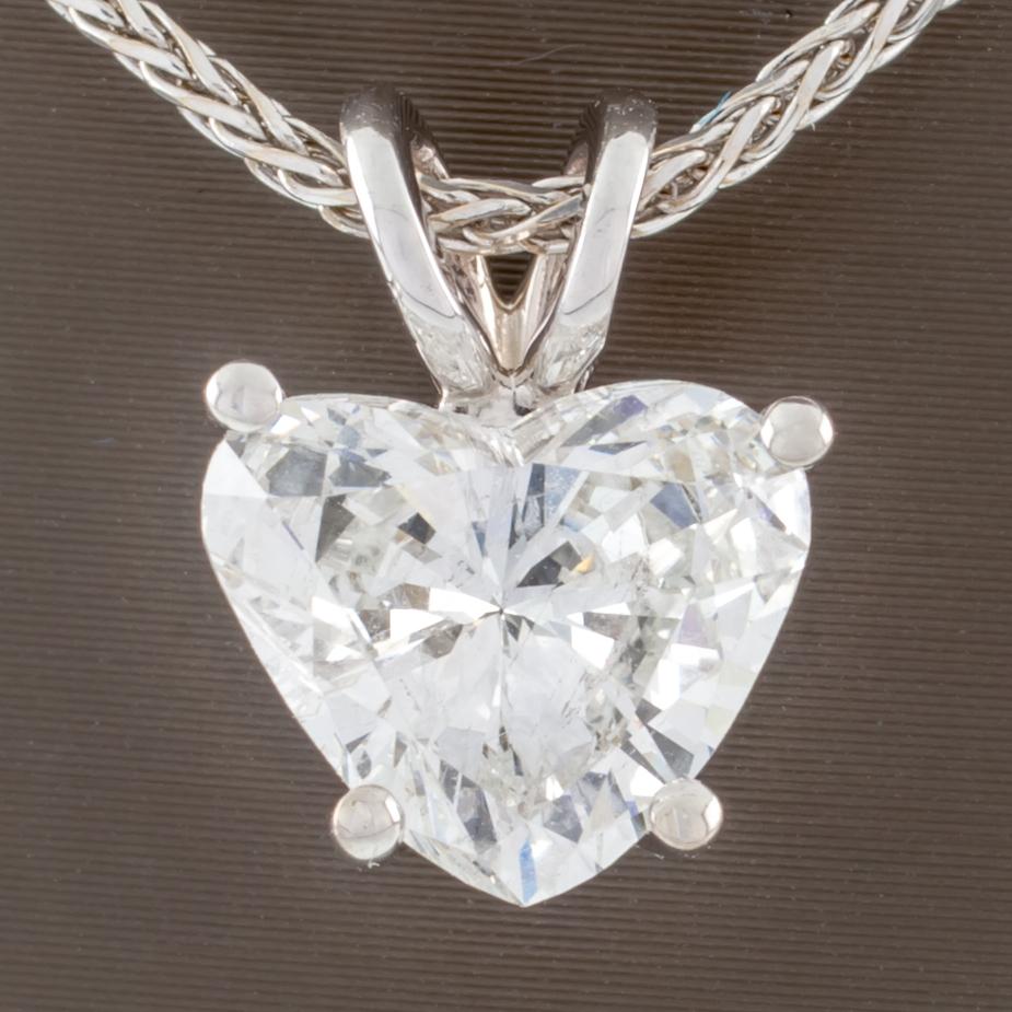 Gorgeous Diamond Heart Solitaire Pendant!
Features 2.0 ct Heart-Shaped Diamond Solitiare
Color: D
Clarity: SI2
Dimensions: 9.53 mm x 8.15 mm x 4.48 mm
Includes 14k White Gold Wheat Chain
16