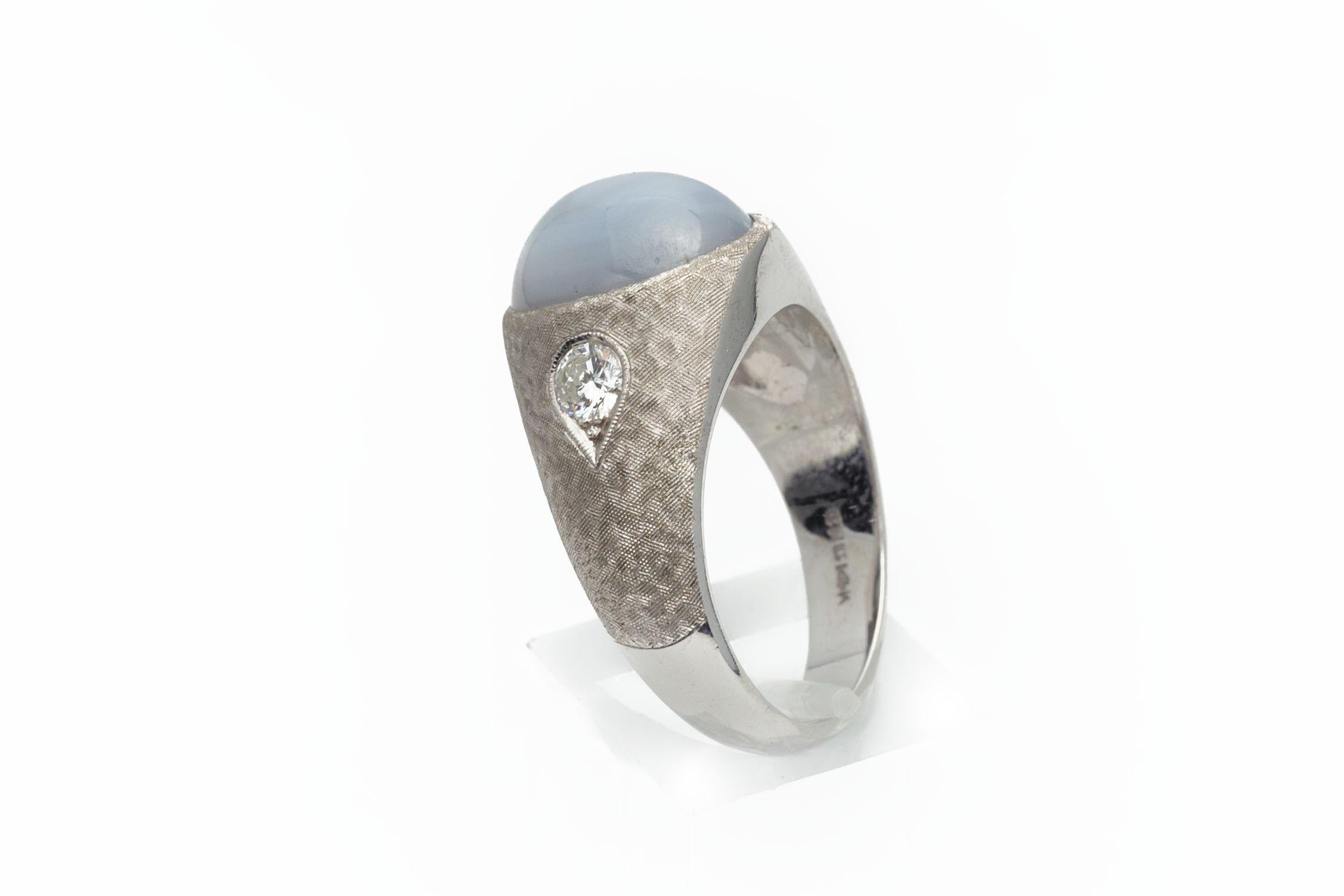 Art Deco 20 Carat Light Blue Untreated Star Sapphire Ring with Diamonds in White Gold