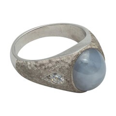 Retro 20 Carat Light Blue Untreated Star Sapphire Ring with Diamonds in White Gold