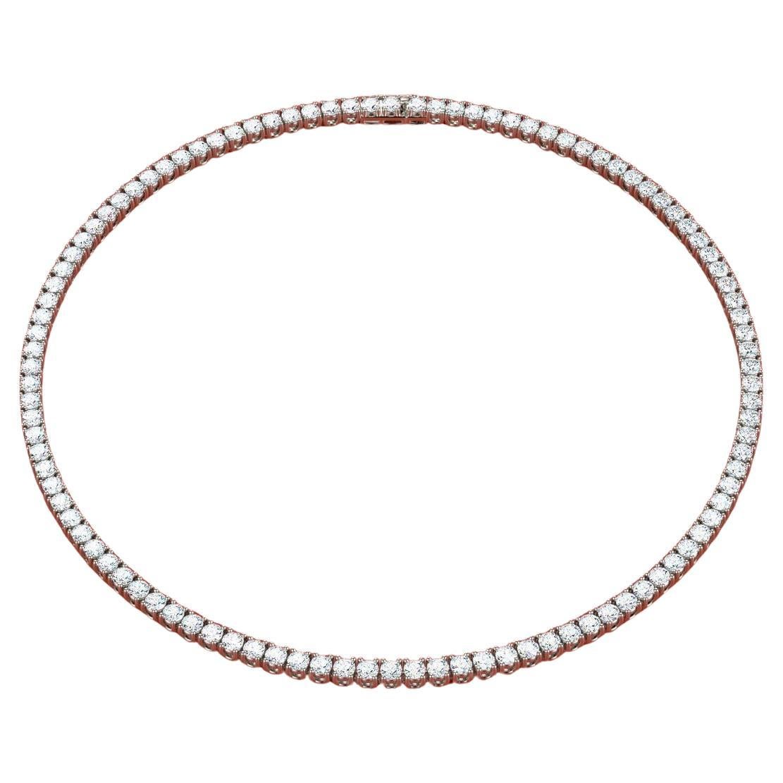 Presenting an exquisite Four-Prong 20 CT TW Natural Diamond Full Tennis Necklace, crafted to adorn the neckline with timeless elegance and sophistication.

Fashioned from luminous 18K white gold, this necklace features a stunning array of