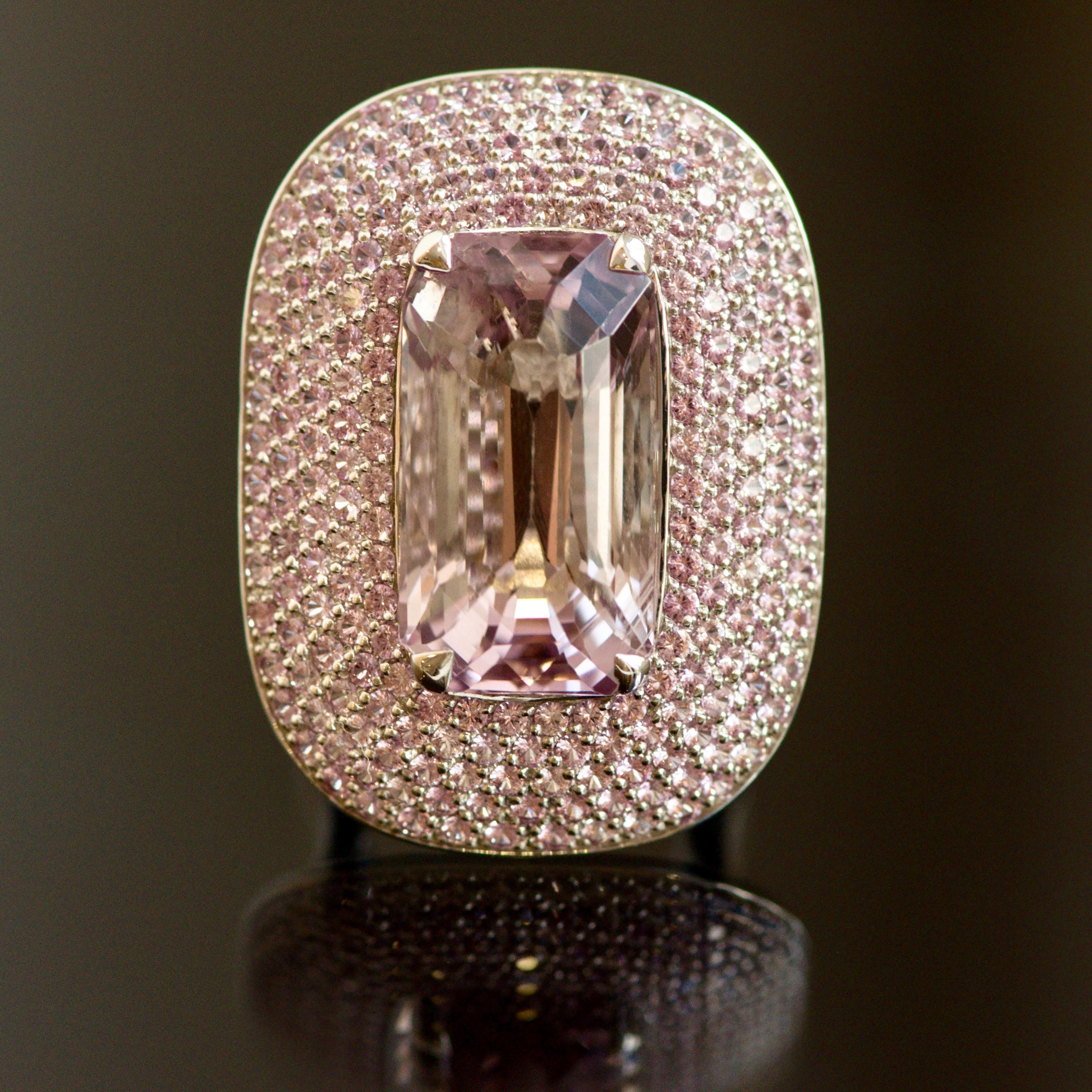 This is an outstanding ring - just look how luxurious this ring is on the hand - 
grayish-pink kunzite, pink sapphires and white gold.
This is one of a kind ring which immediately attracts the attention. 
And it's impossible to make a copy of this