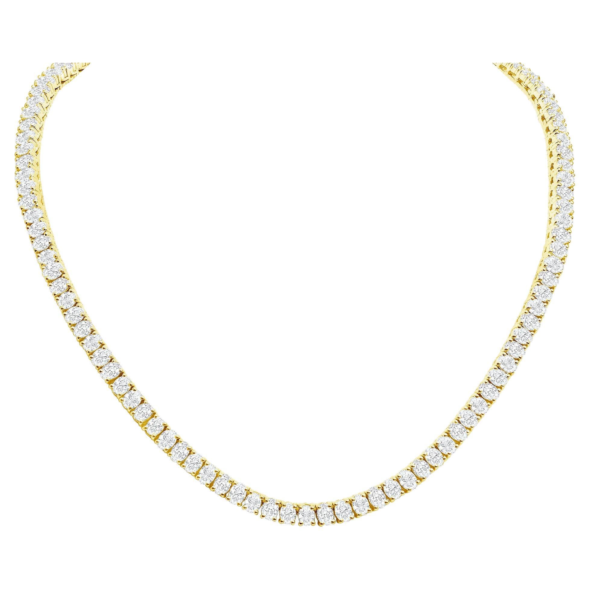 This diamond tennis necklace features beautifully cut Oval diamonds set gorgeously in 18k gold.

Metal: 18k Gold
Diamond Cut: Oval Natural (Not Lab Grown or Moissanite) 
Total Approx. Diamond Carats: 20
Diamond Clarity: VS
Diamond Color: F-G
Size: