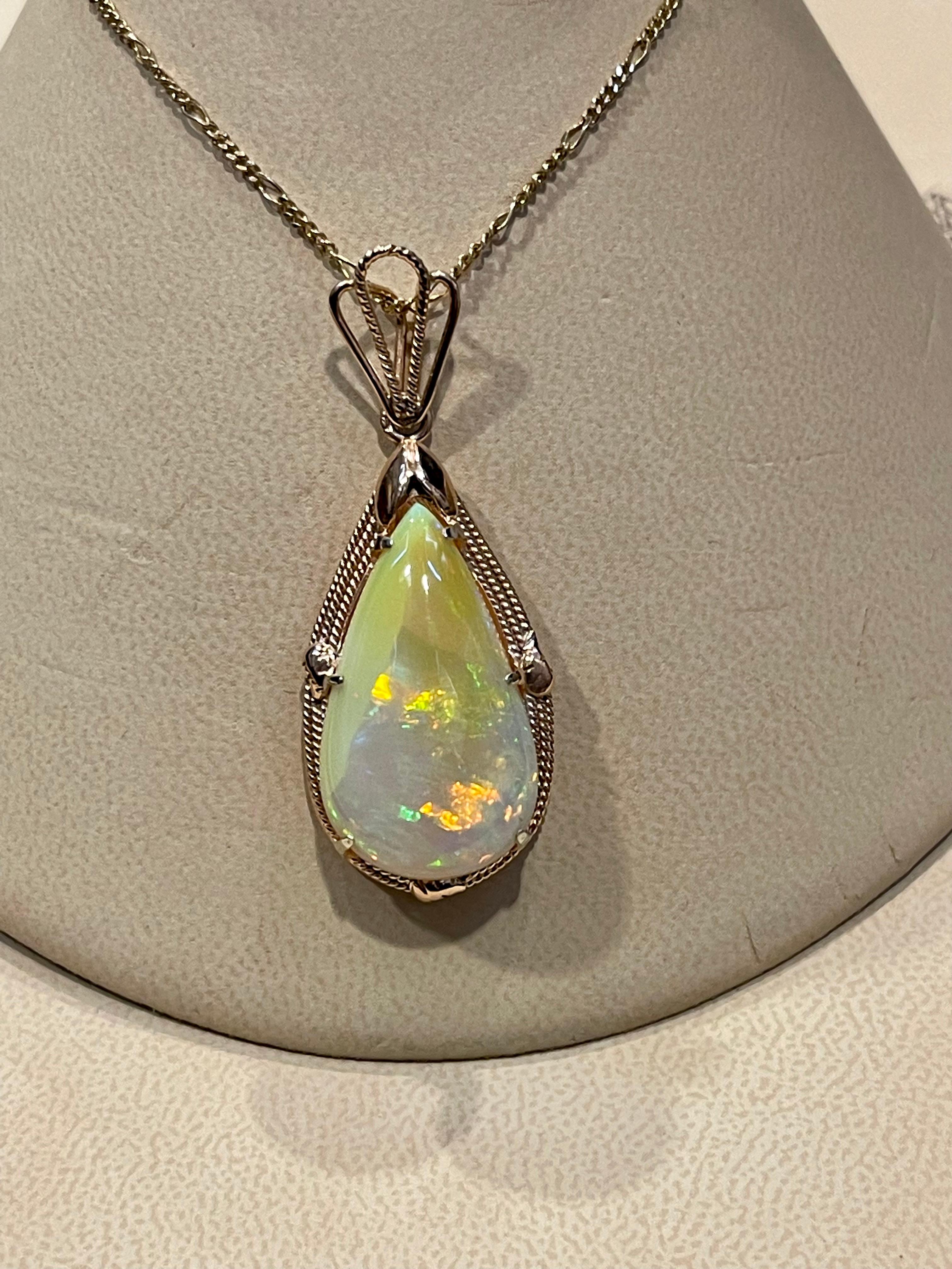 20 Carat Pear Ethiopian Opal  Pendant / Necklace 18 Karat Yellow Gold Estate In Excellent Condition For Sale In New York, NY