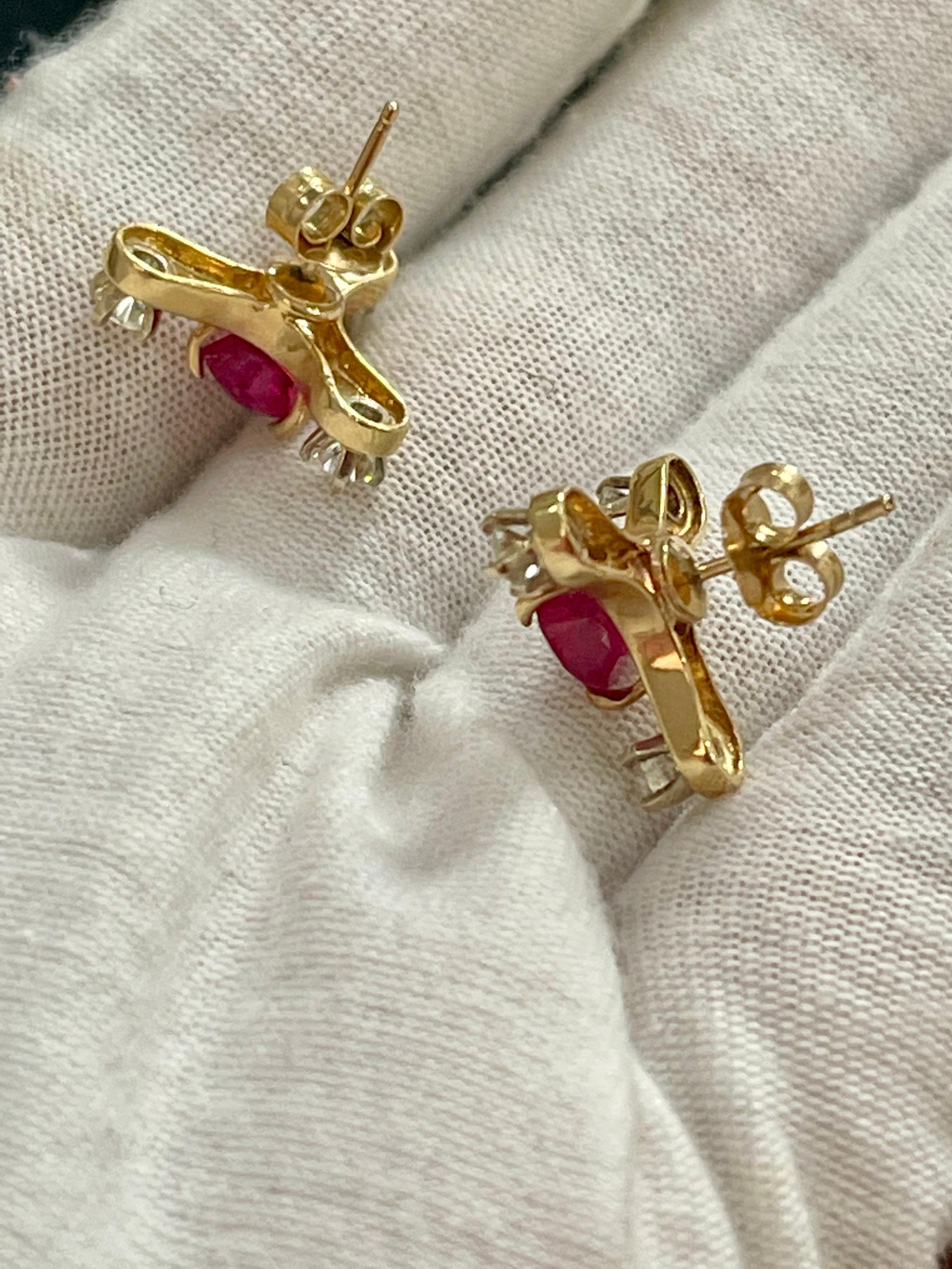 
Approximately 2.0 Carat Round Treated Ruby and Natural Diamond Stud Post Earrings 14 Karat Yellow Gold
Two Rubies weighing approximately 2.0 carats Total
There are 6 brilliant cut diamonds approximately 0.90 Ct total diamonds
Each stud has a three