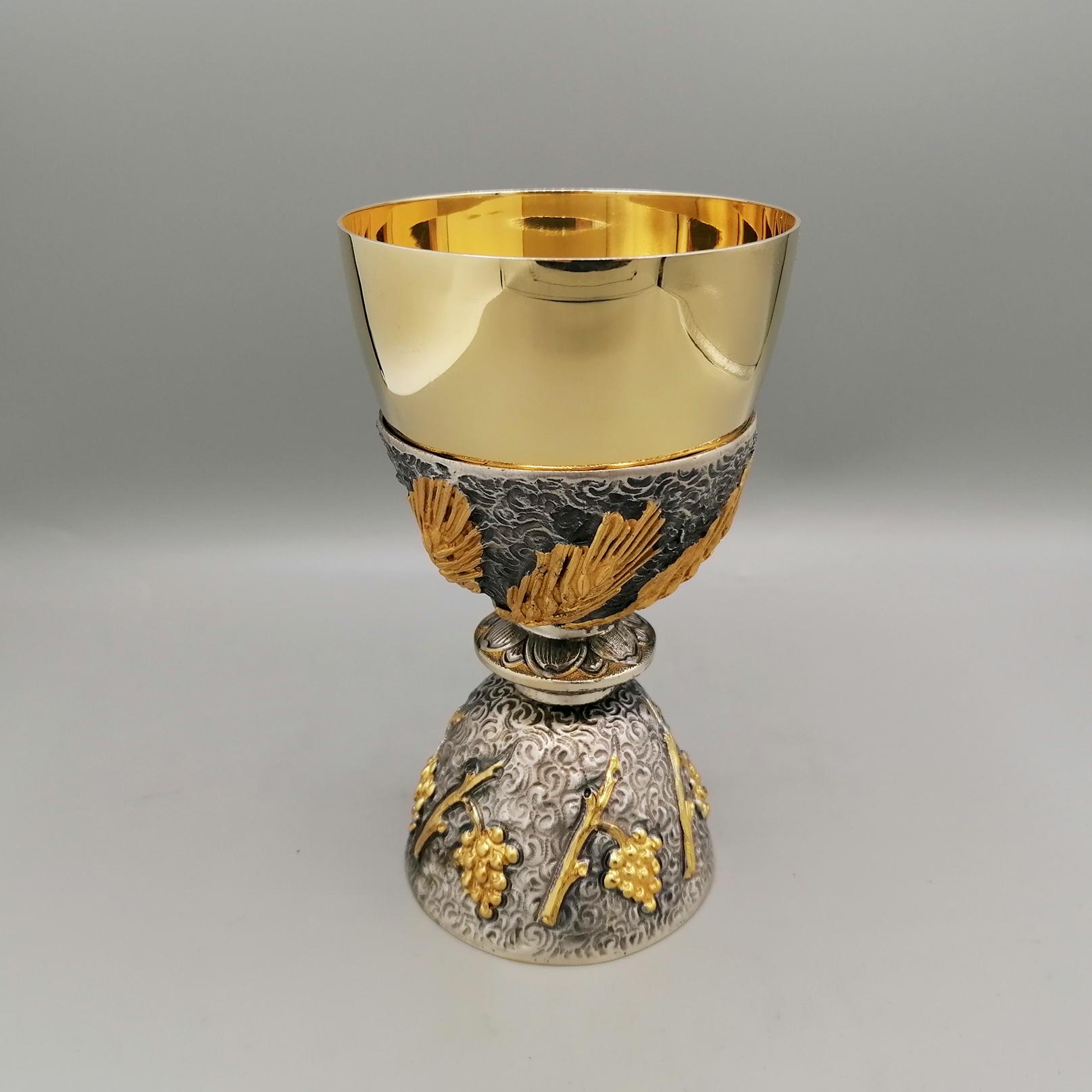 Liturgical chalice made of sterling silver. 
The body was made using the casting technique while the chalice cup was made from a lathe-turned silver sheet and then plated with 24kt gold.
The base of the chalice was made with designs of grape shoots