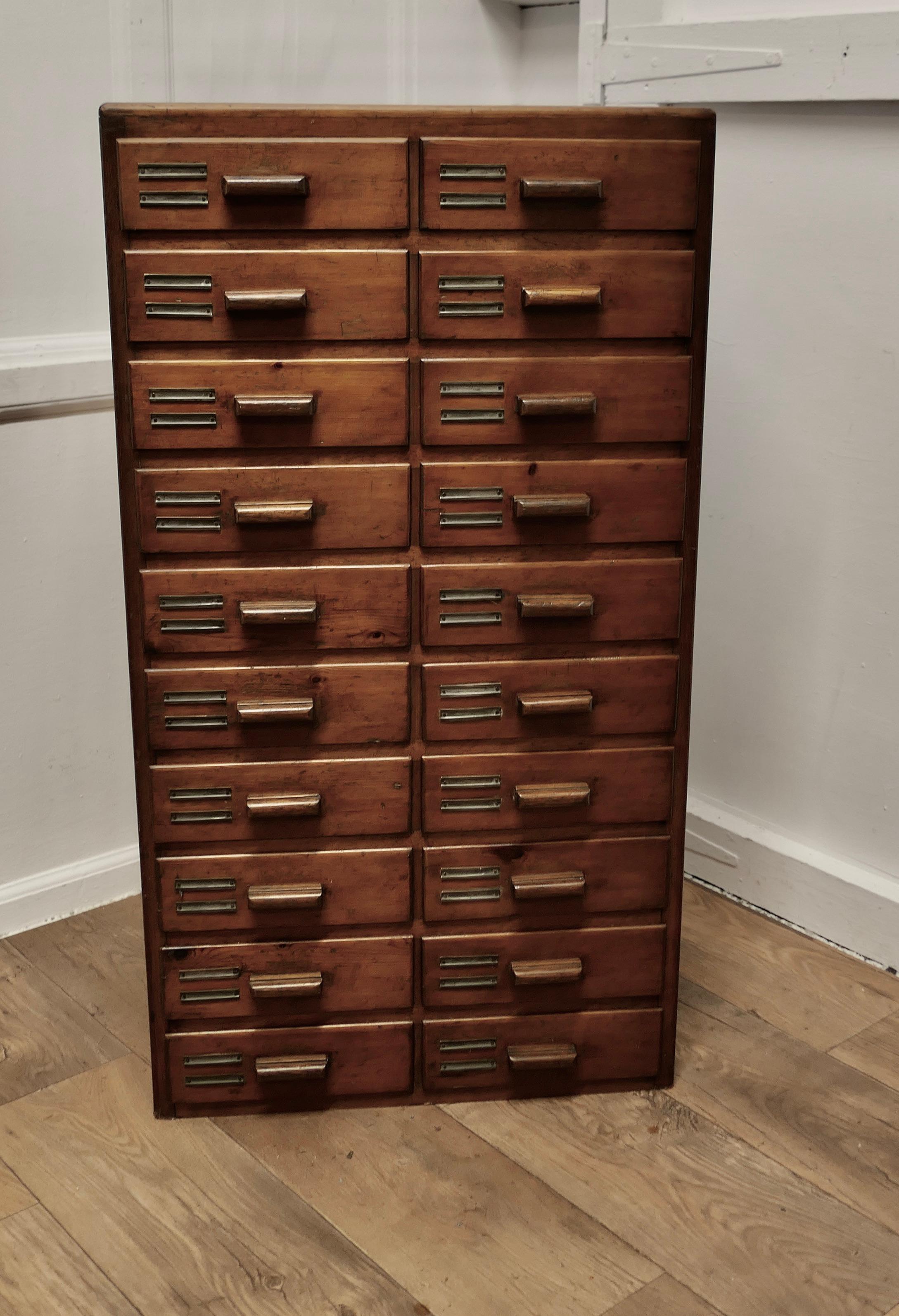 20 Drawer Art Deco A4 Filing Cabinet

This is a good sturdy cabinet, the drawers are 3” deep and a good fit fro A4 documents, the fronts are in stained pine with a matching handle and each one has a metal label holder
The cabinet is in sound
