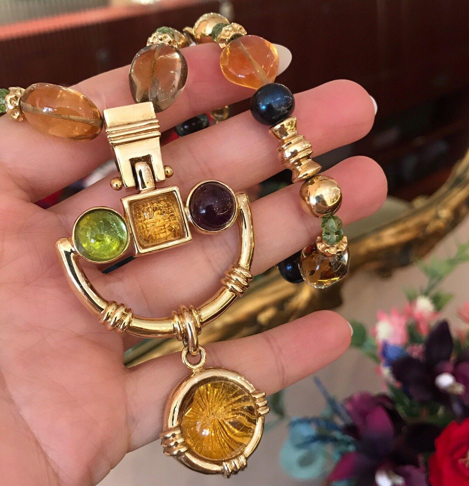 20 Inch Beaded Pendant Necklace with Citrine, Peridot, and Tourmaline in 14k Yellow Gold

Heavy Pendant Necklace features an 18-inch-long Beaded Necklace with a  Large Pendant Drop made of Citrine, Peridot, and Tourmaline in 14k Yellow