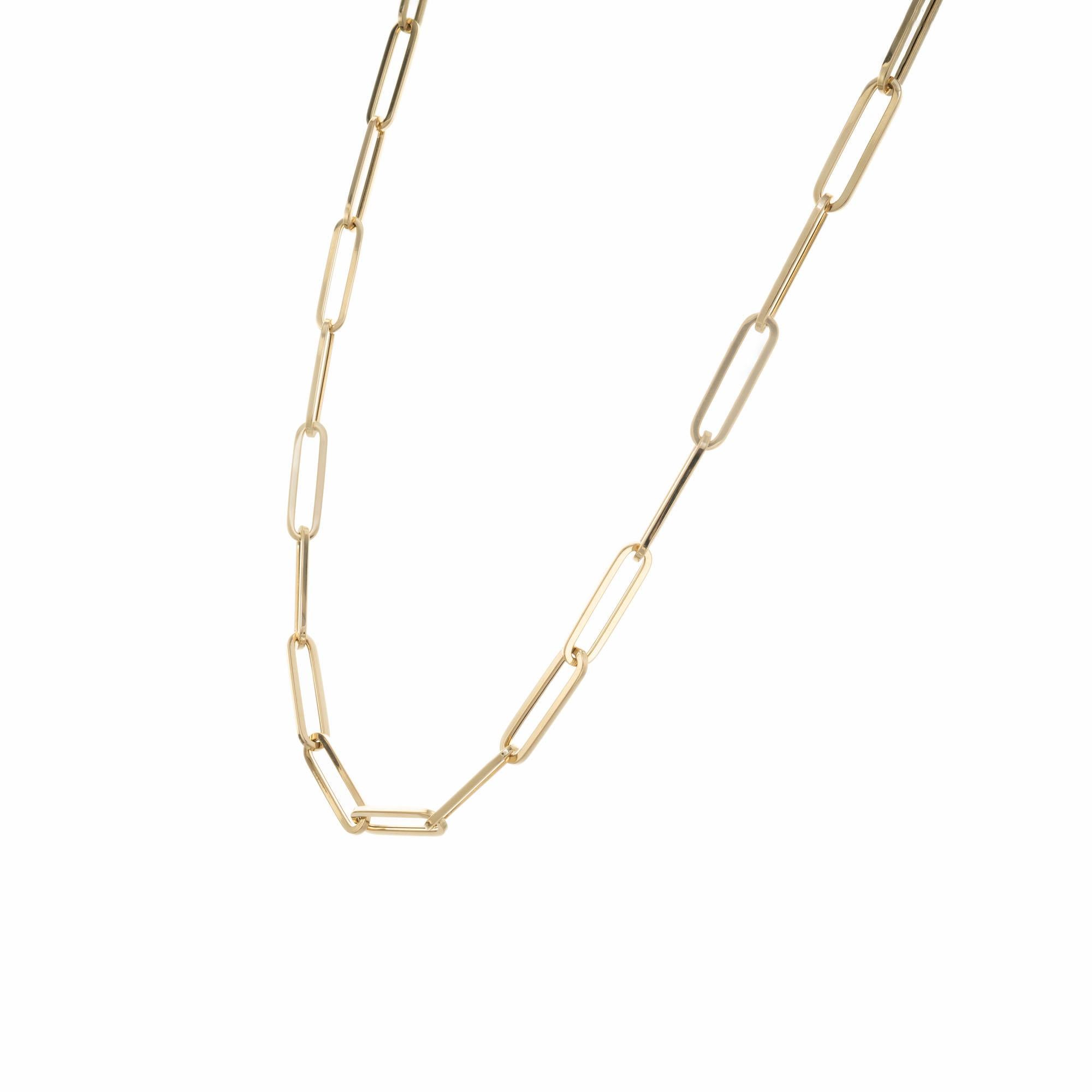 20 Inch 14k yellow gold elongated oval link chain. Made in Italy. 20 inches long. 

14k yellow gold 
Stamped: 14k Italy
12.4 grams
Total length: 20 Inches
Width: 5.85mm
Thickness/depth: 1.37mm

