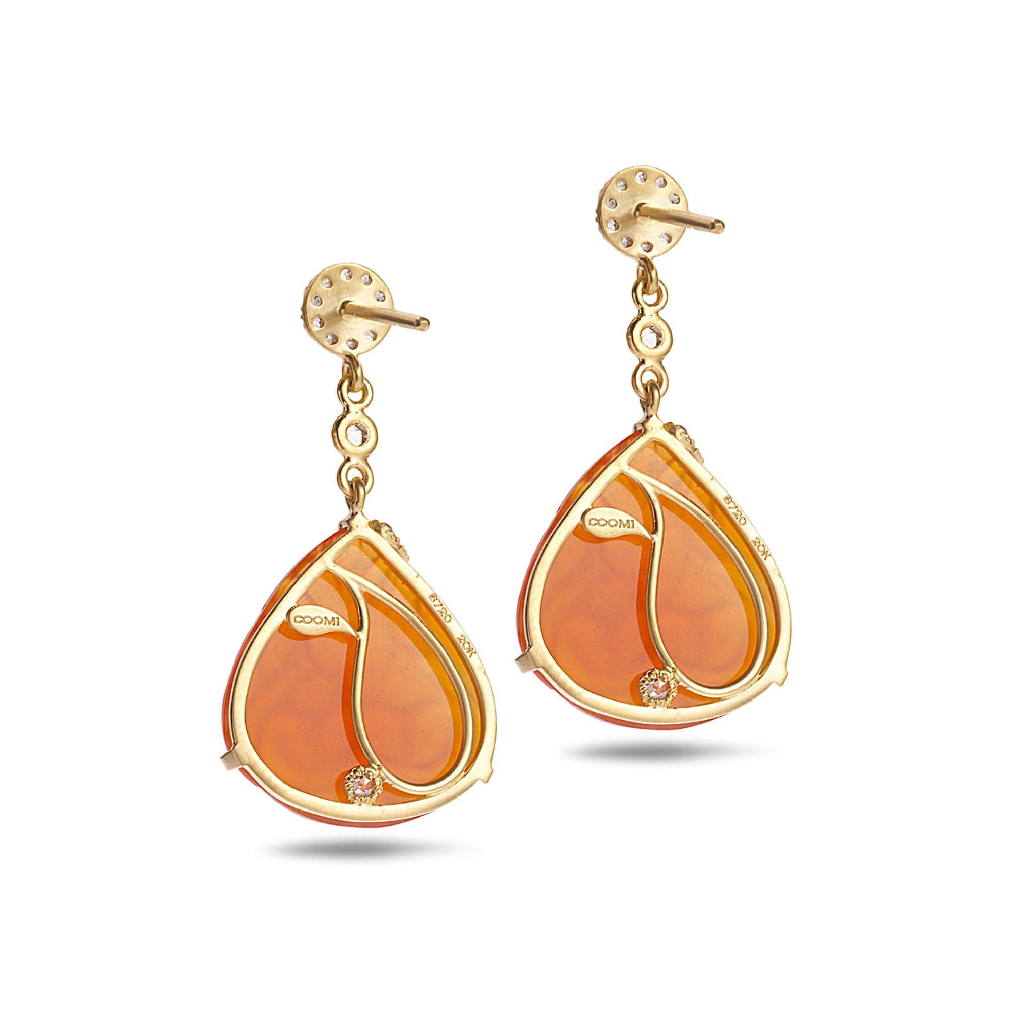 Affinity earrings set in 20K yellow gold with 14.21cts carnelian and 0.49cts diamond. Earrings measure 1.25 inches in length and 5/8 of an inch at the widest part.
