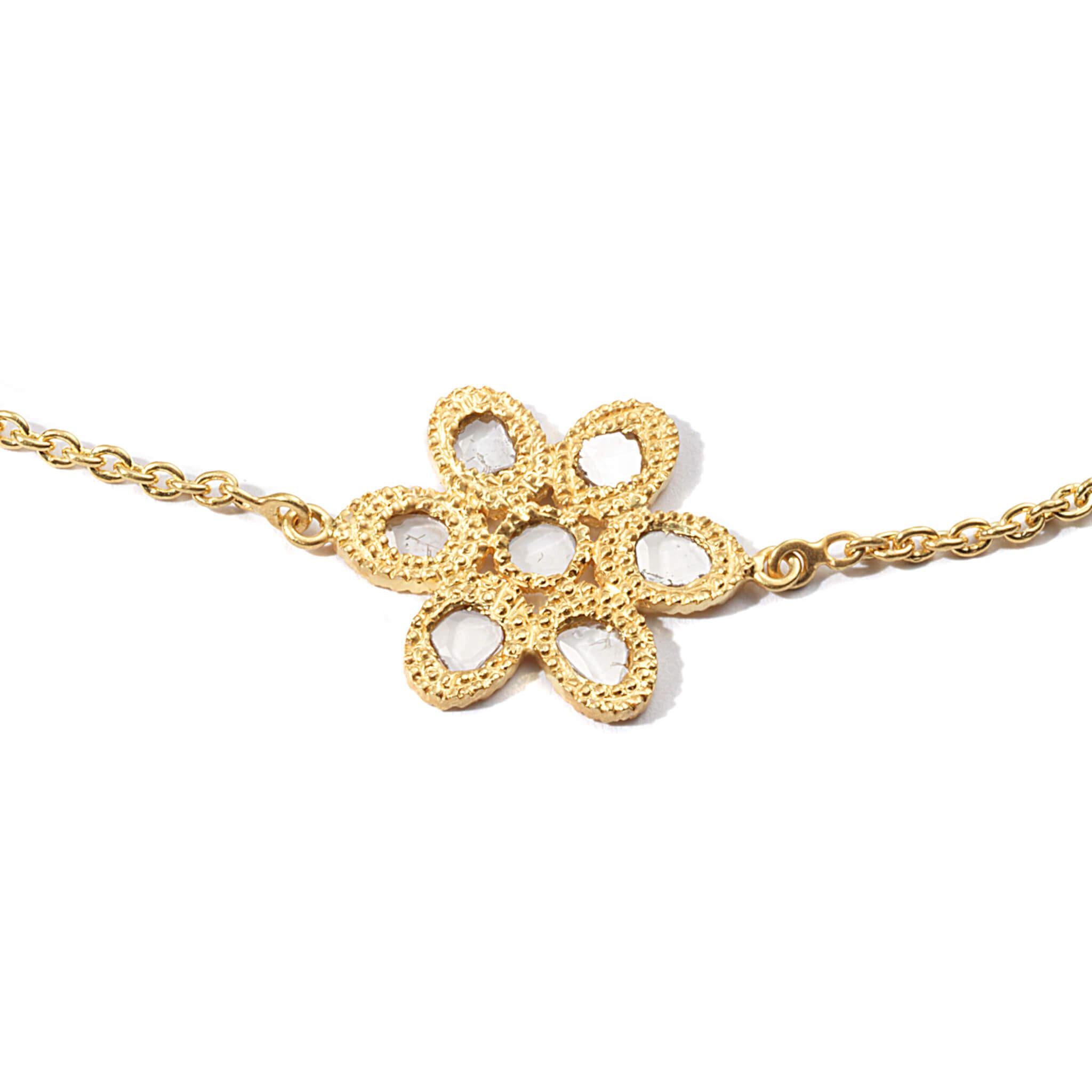 Affinity flower bracelet set in 20K yellow gold with 0.68cts diamond.
