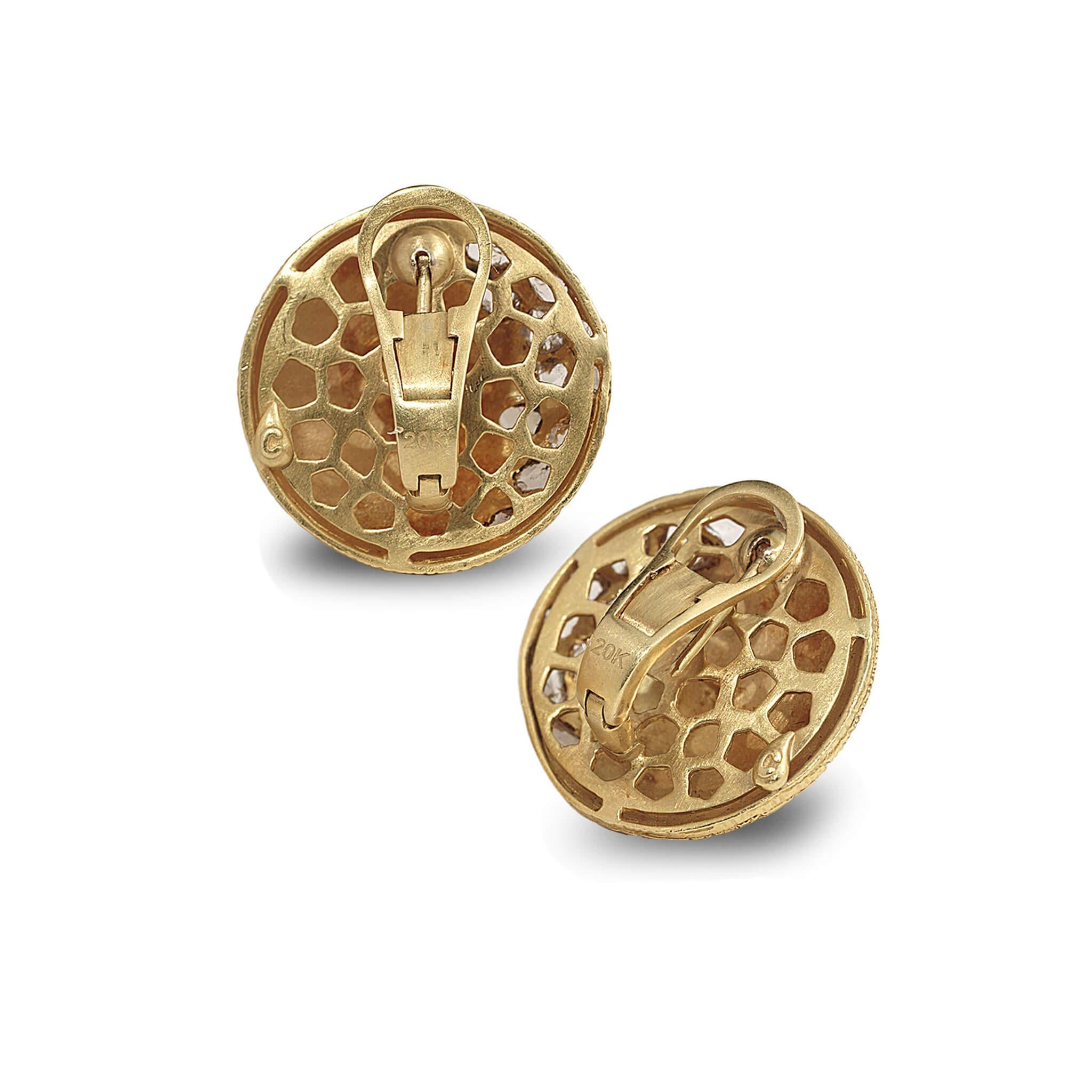 Eternity button earrings set in 20K yellow gold with 1.29cts diamond, post and clip back.
