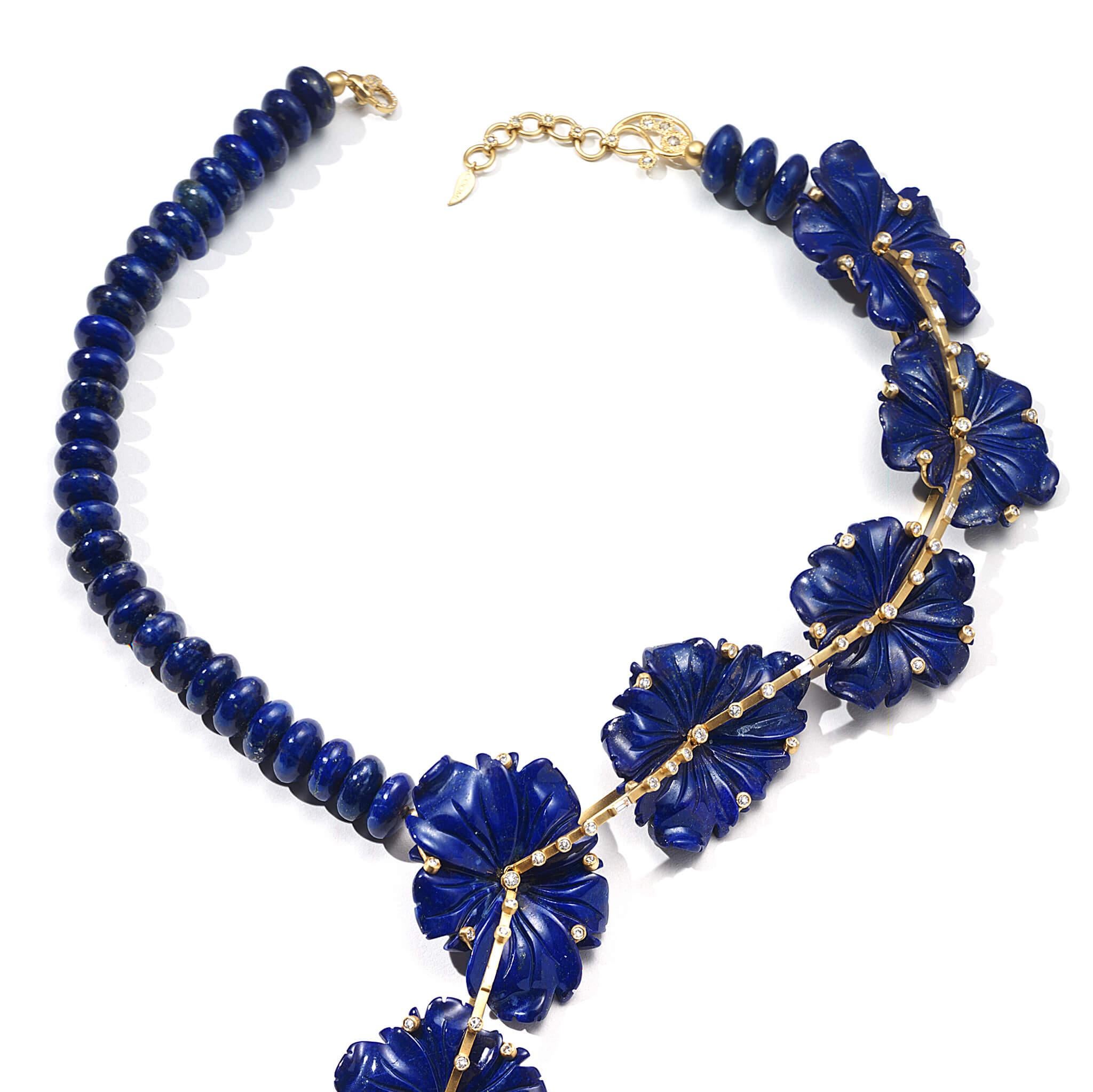 Affinity flower necklace set in 20K yellow gold with 438.21cts blue lapis and 3.96cts diamond.
