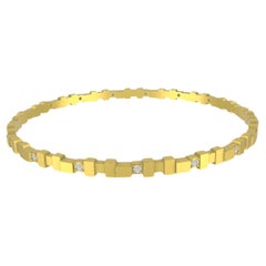 Bracelet jonc en or jaune 20 carats et diamant