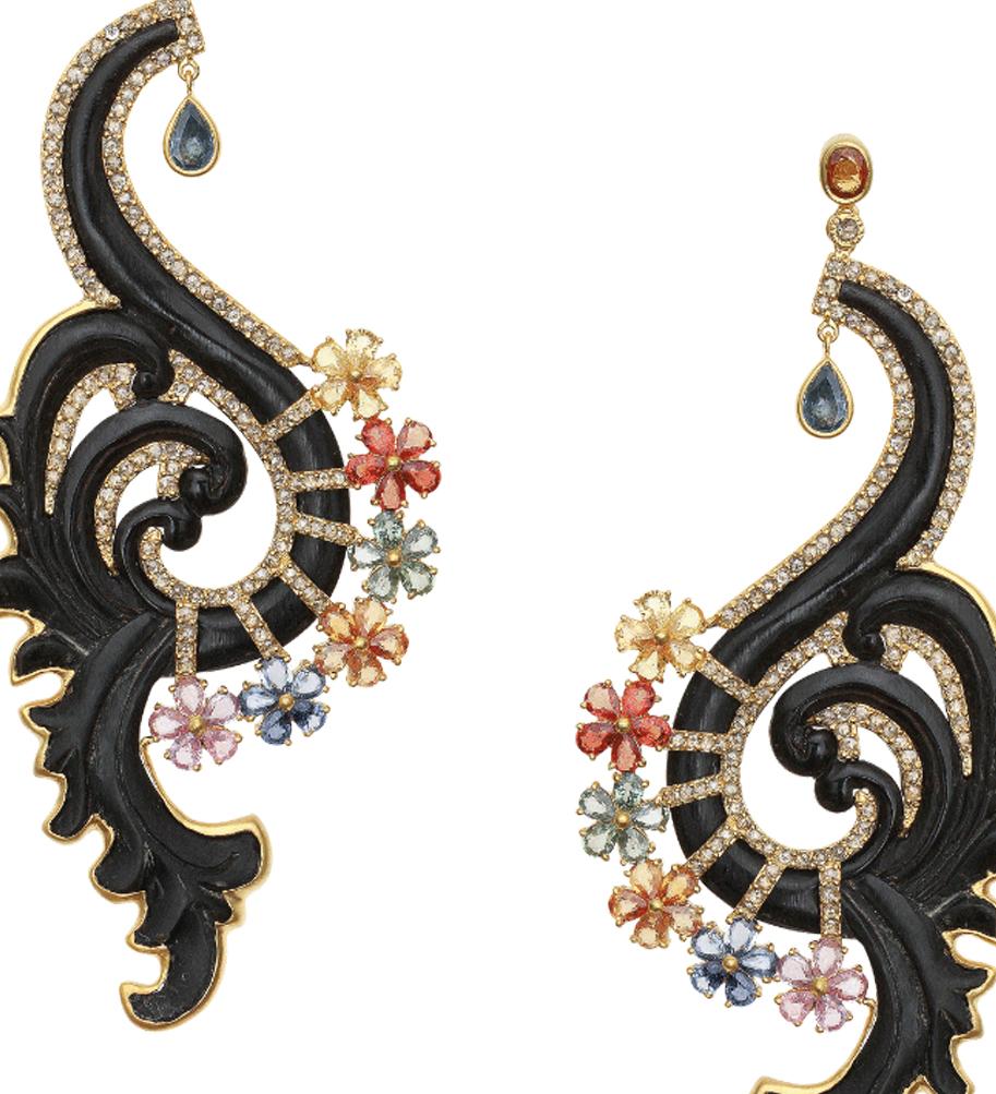 Mesmerizing Ebony Wood earrings set in 20 Karat Yellow Gold with multi-sapphires shaped like flowers weighing approximately  13.76 carats and 4.31 carats diamonds. Every detail of these earrings has been hand-crafted by the highest quality of